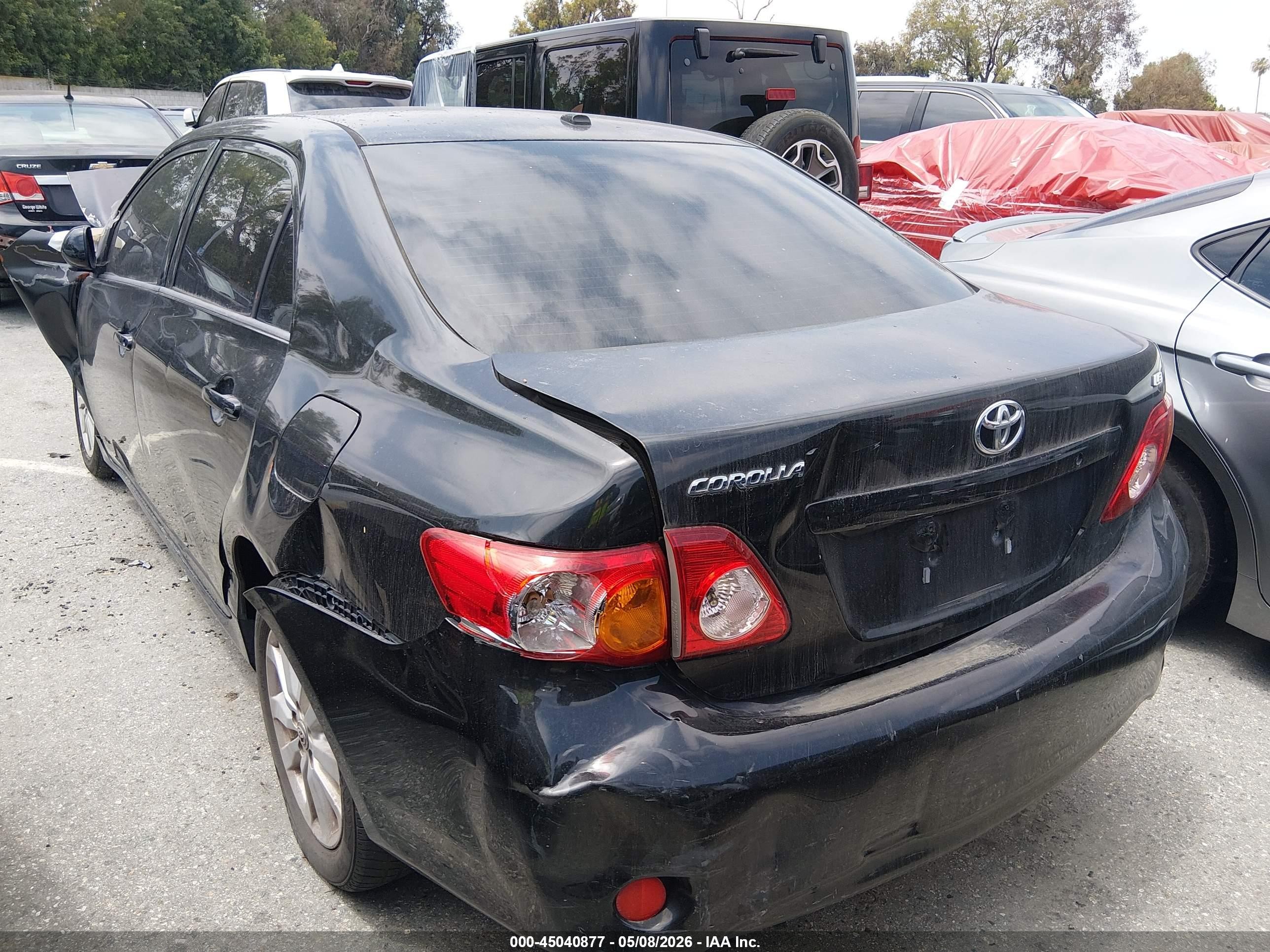 2010 Toyota Corolla Le Black vin: JTDBU4EE7AJ061303