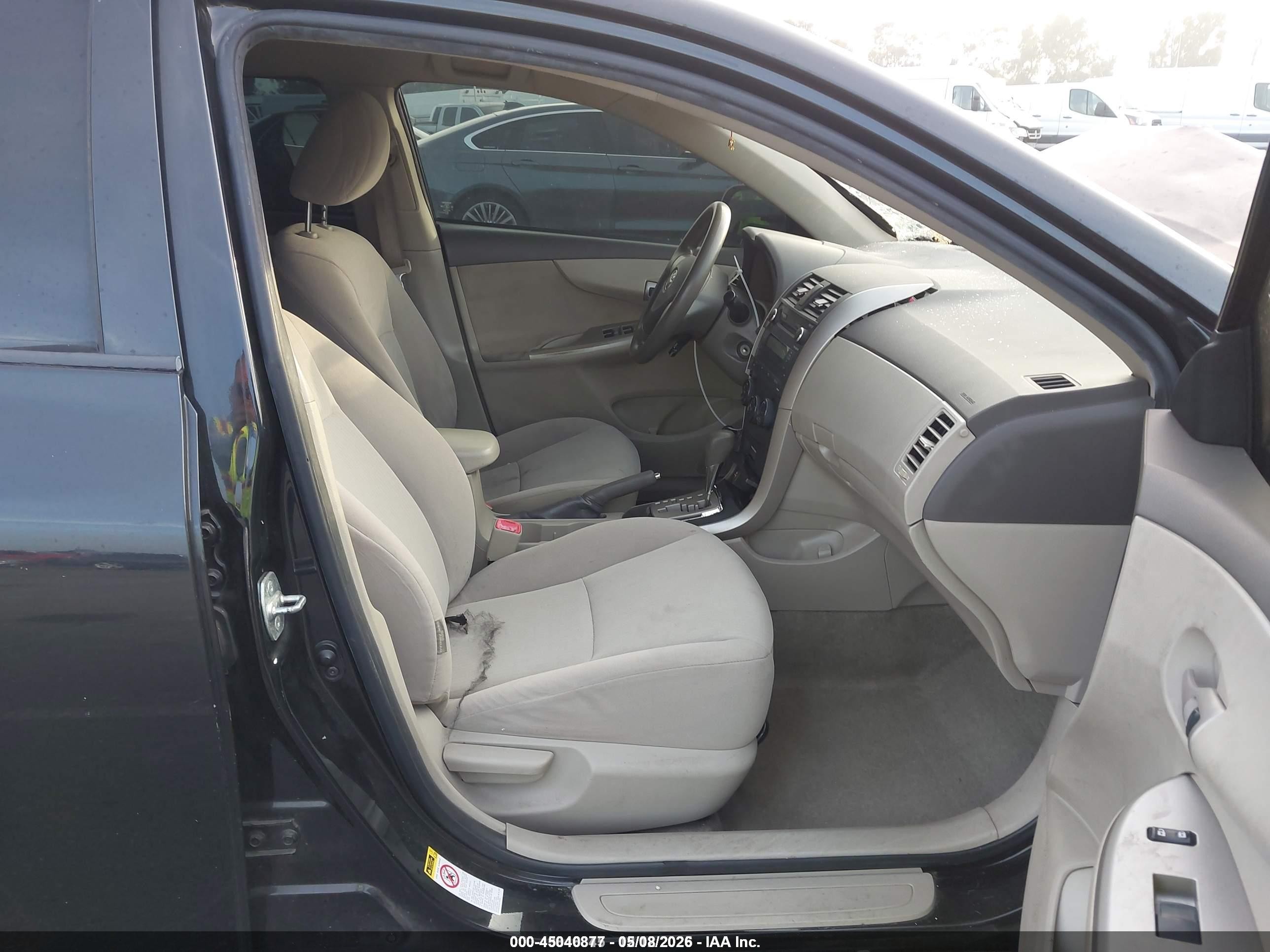 2010 Toyota Corolla Le Black vin: JTDBU4EE7AJ061303