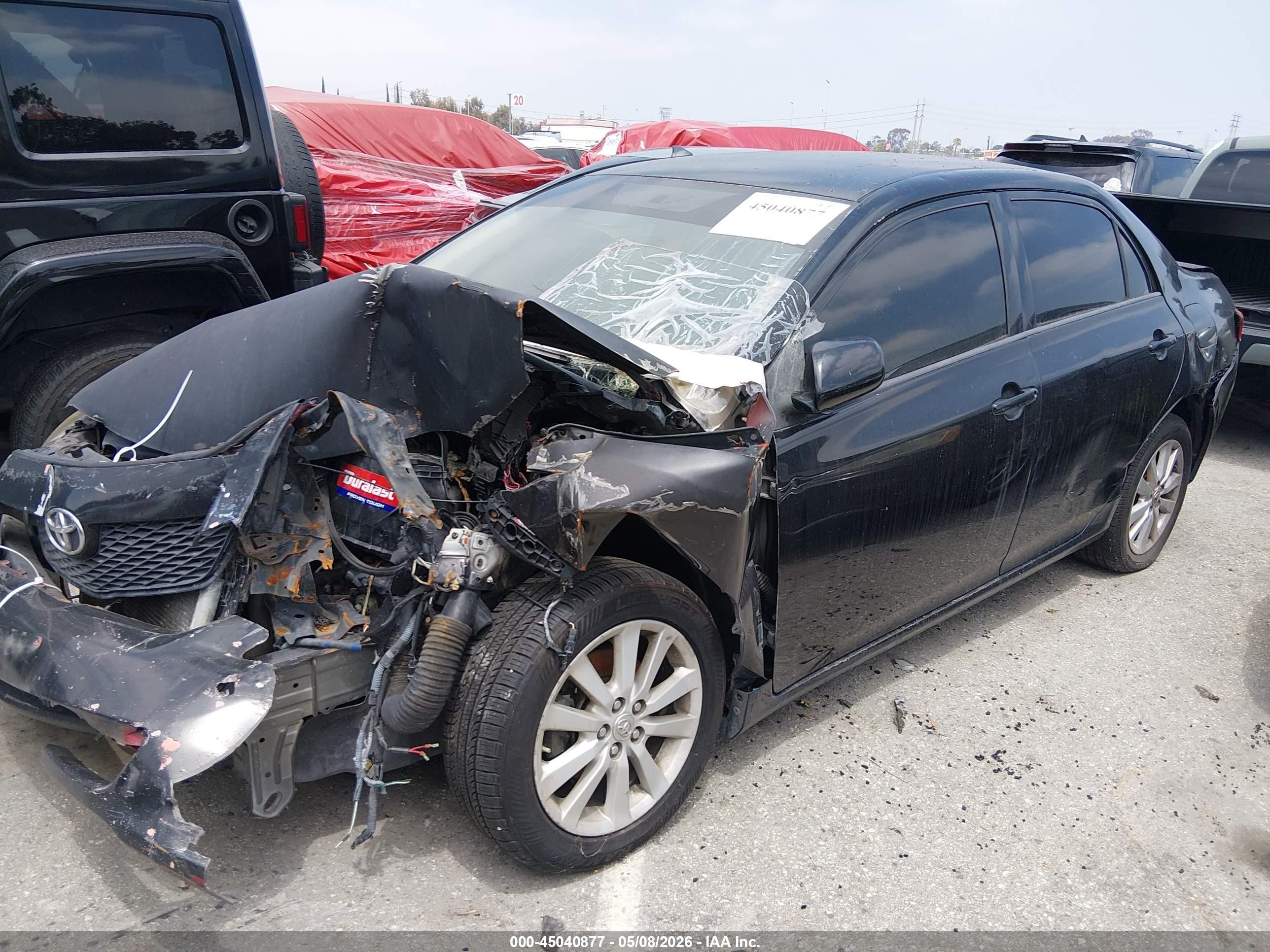 2010 Toyota Corolla Le Black vin: JTDBU4EE7AJ061303
