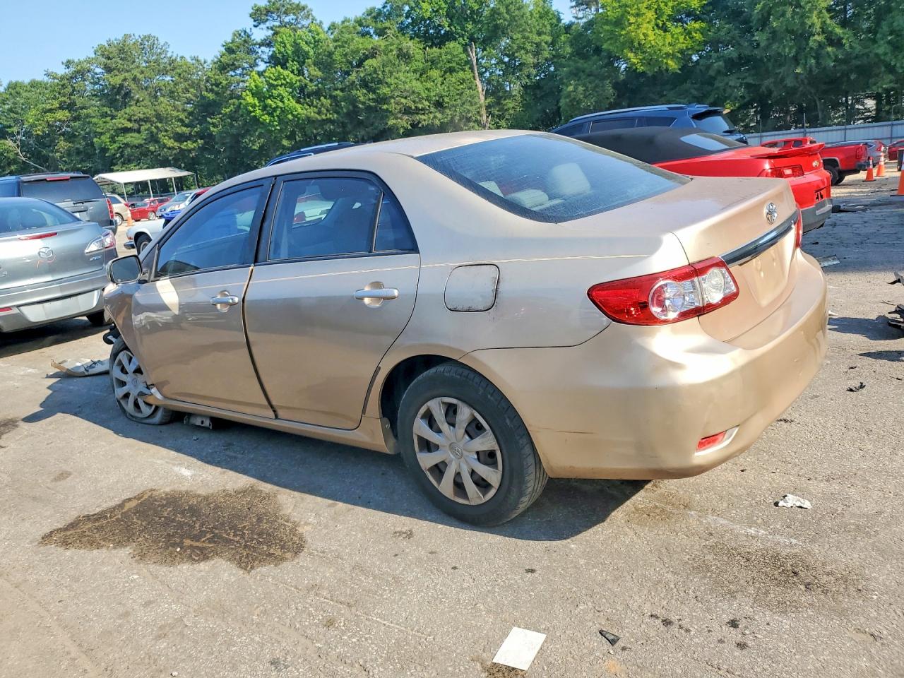 2011 Toyota Corolla Le Gold vin: JTDBU4EE7B9125875