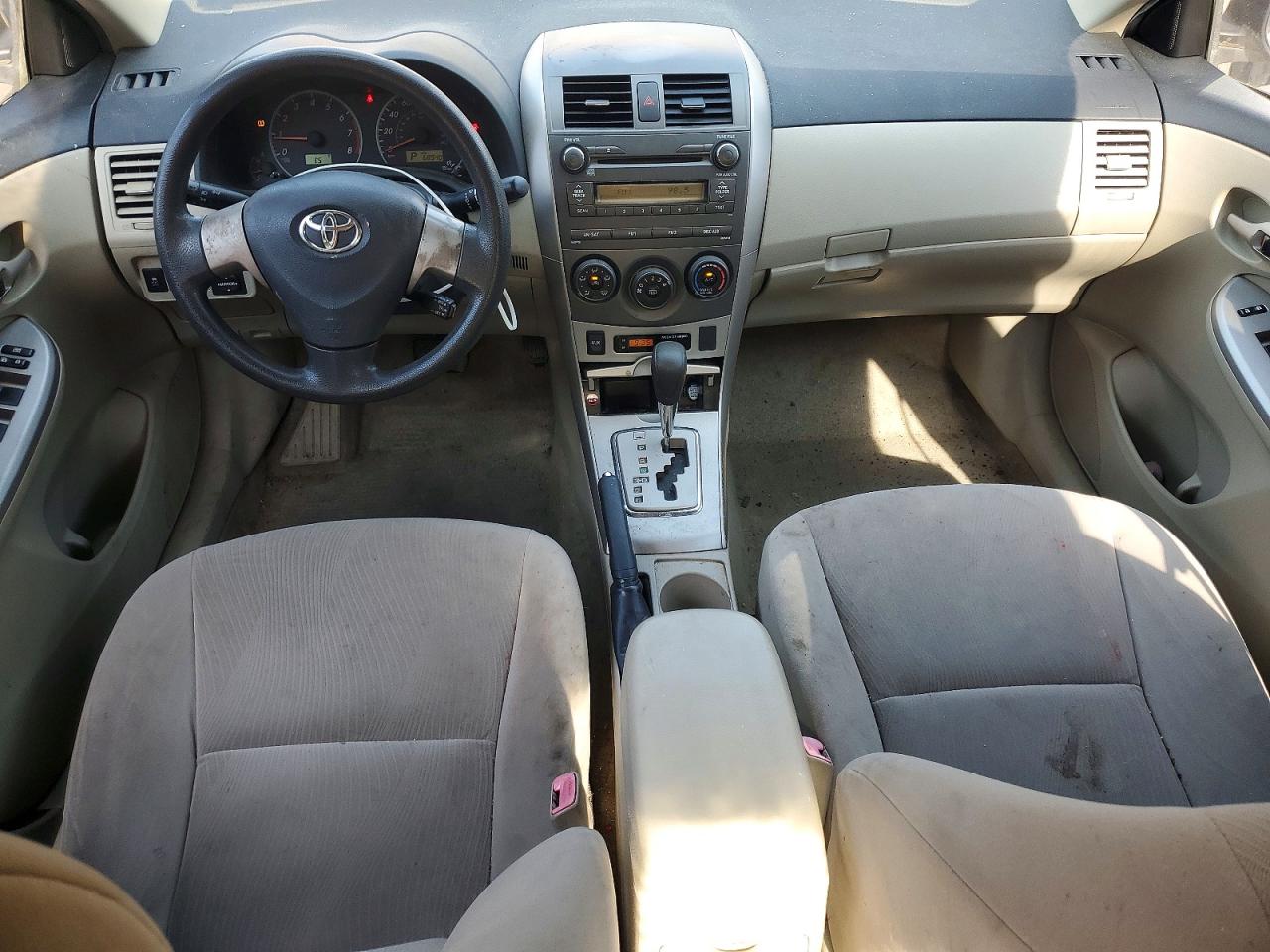 2011 Toyota Corolla Le Gold vin: JTDBU4EE7B9125875