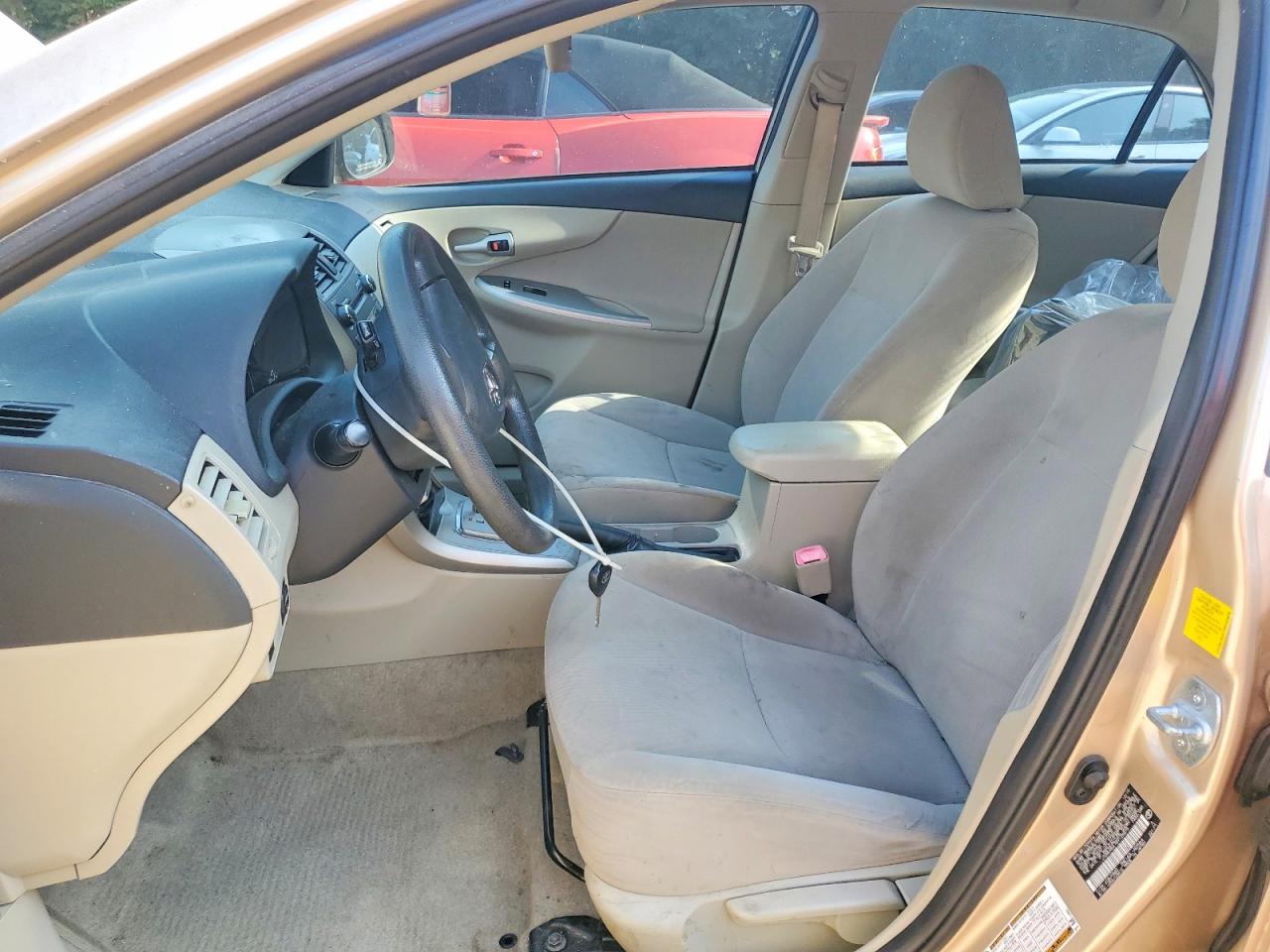 2011 Toyota Corolla Le Gold vin: JTDBU4EE7B9125875