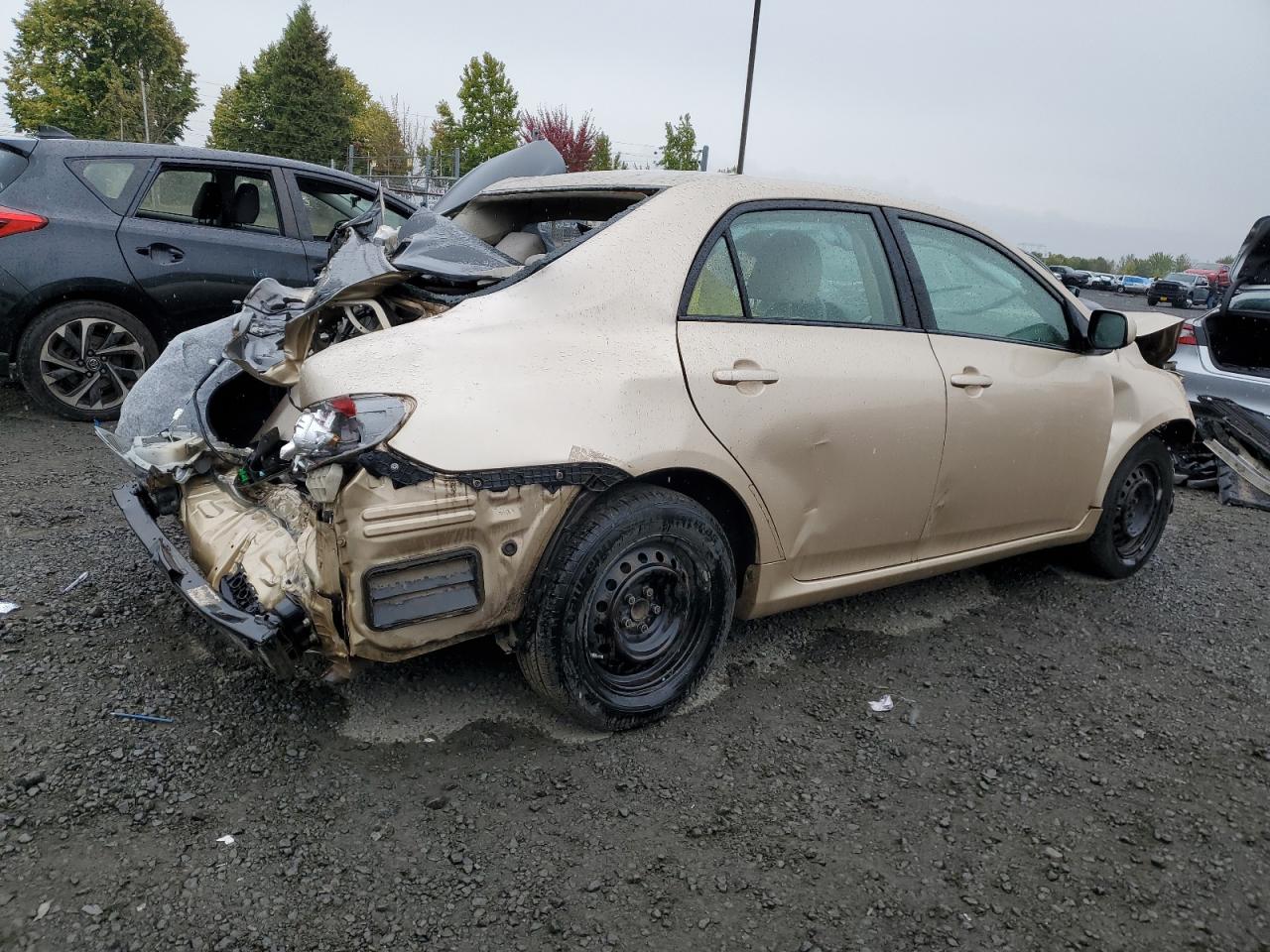2011 Toyota Corolla Base Gold vin: JTDBU4EE7B9140618