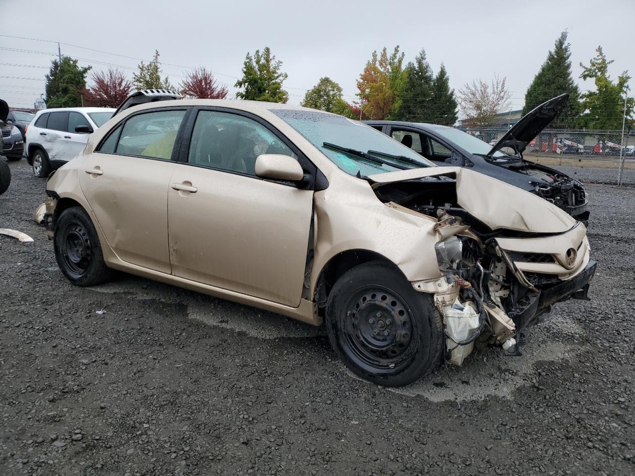 2011 Toyota Corolla Base Gold vin: JTDBU4EE7B9140618