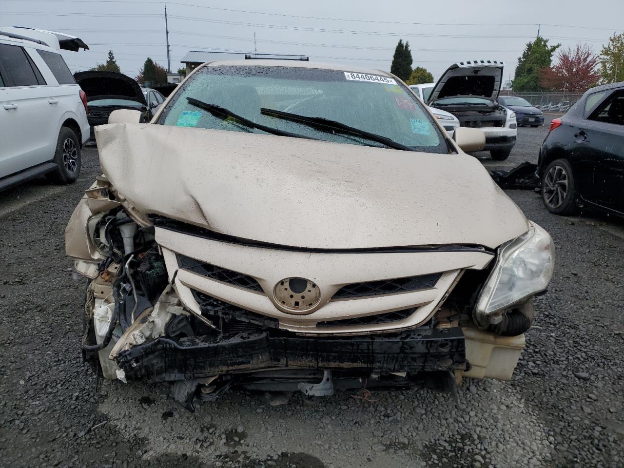 2011 Toyota Corolla Base Gold vin: JTDBU4EE7B9140618