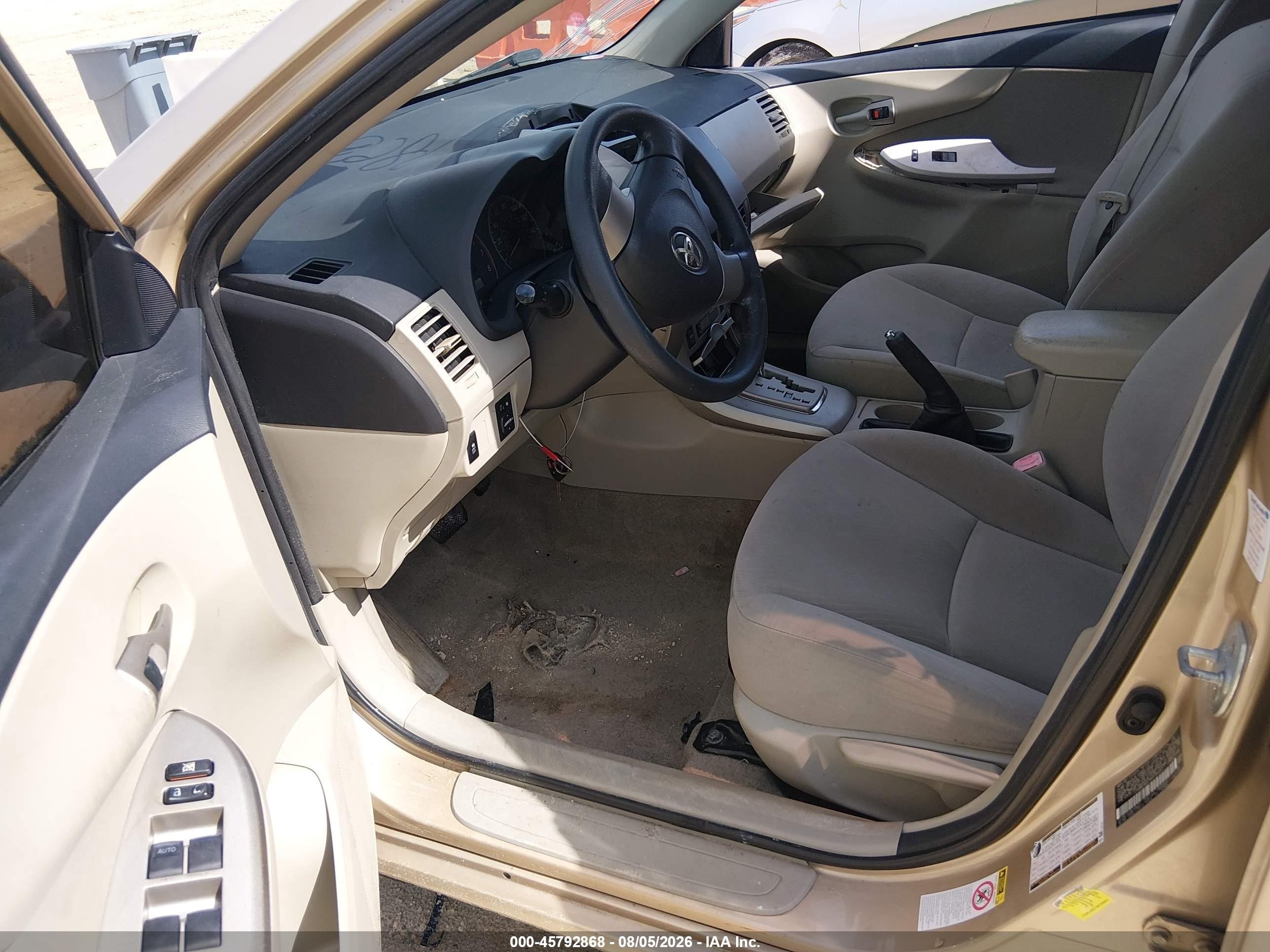 2011 Toyota Corolla Le Champagne vin: JTDBU4EE7B9155541