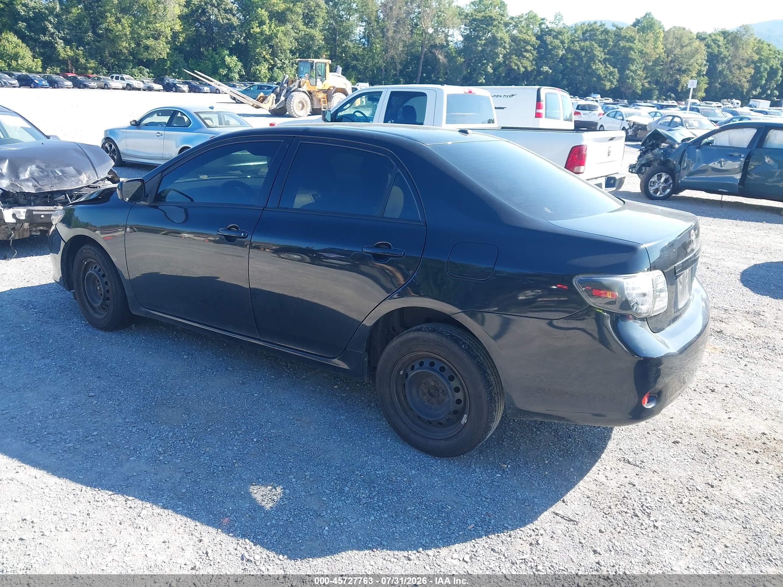 2010 Toyota Corolla Le Black vin: JTDBU4EE8A9104077