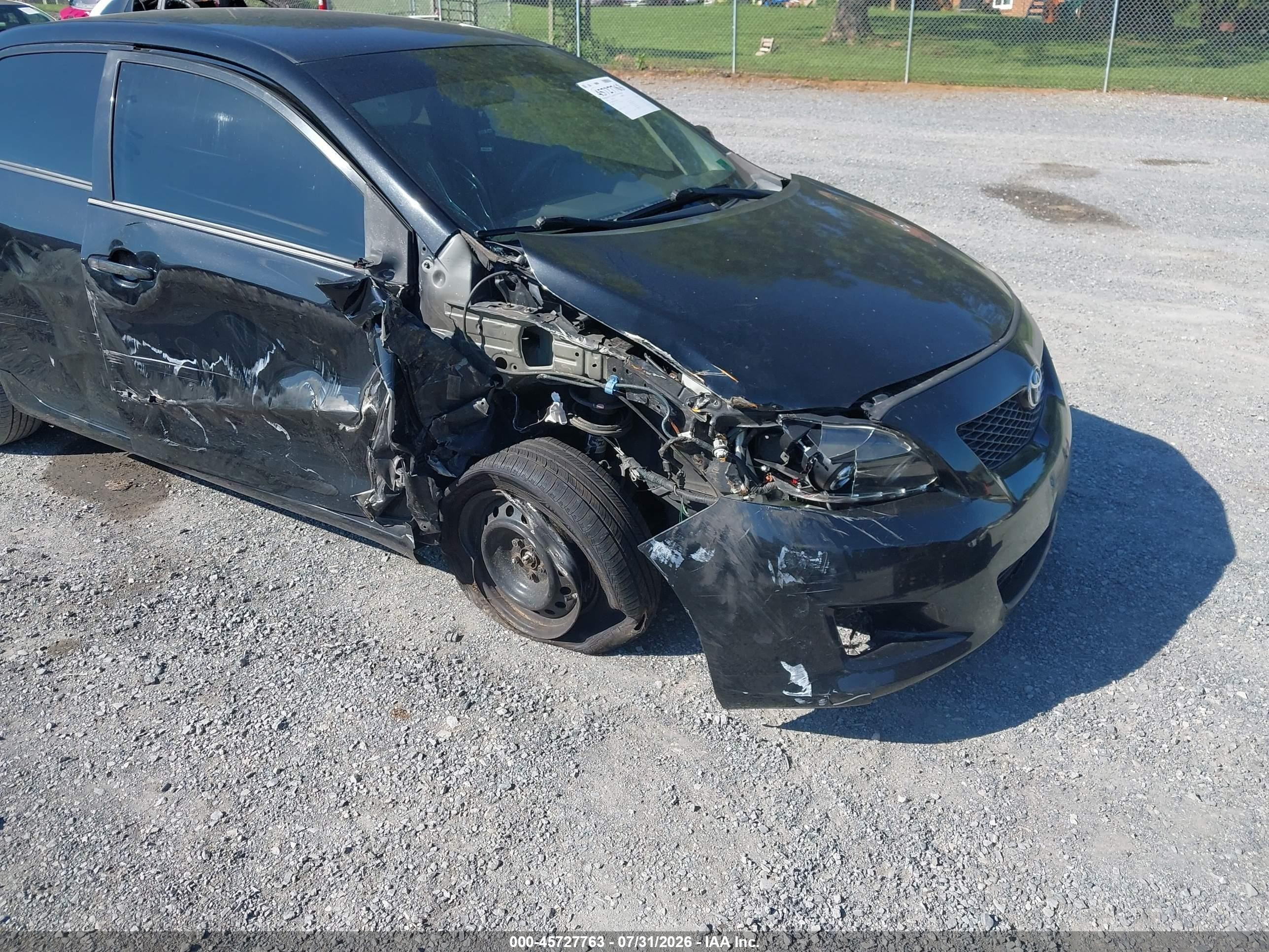 2010 Toyota Corolla Le Black vin: JTDBU4EE8A9104077