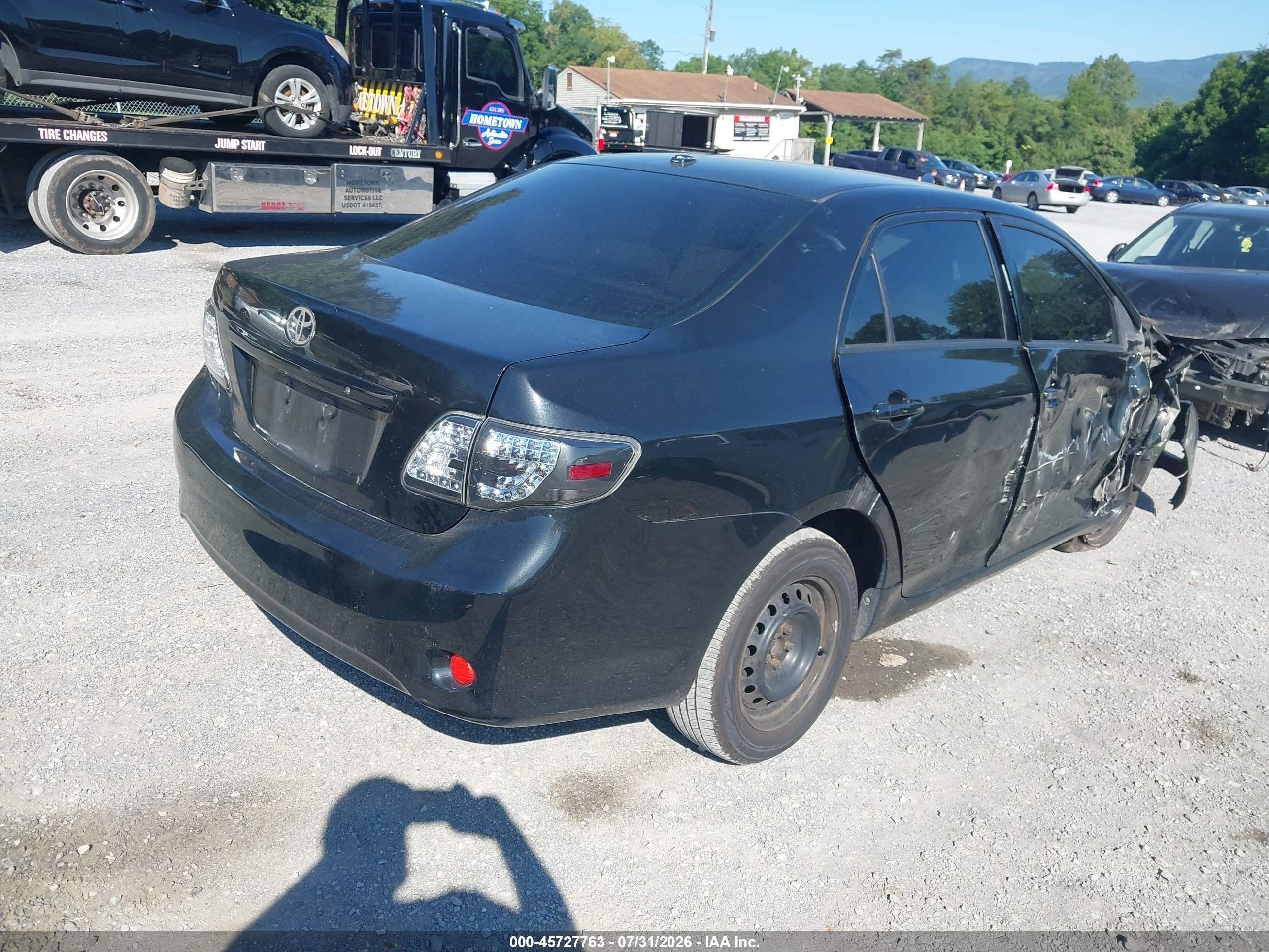 2010 Toyota Corolla Le Black vin: JTDBU4EE8A9104077