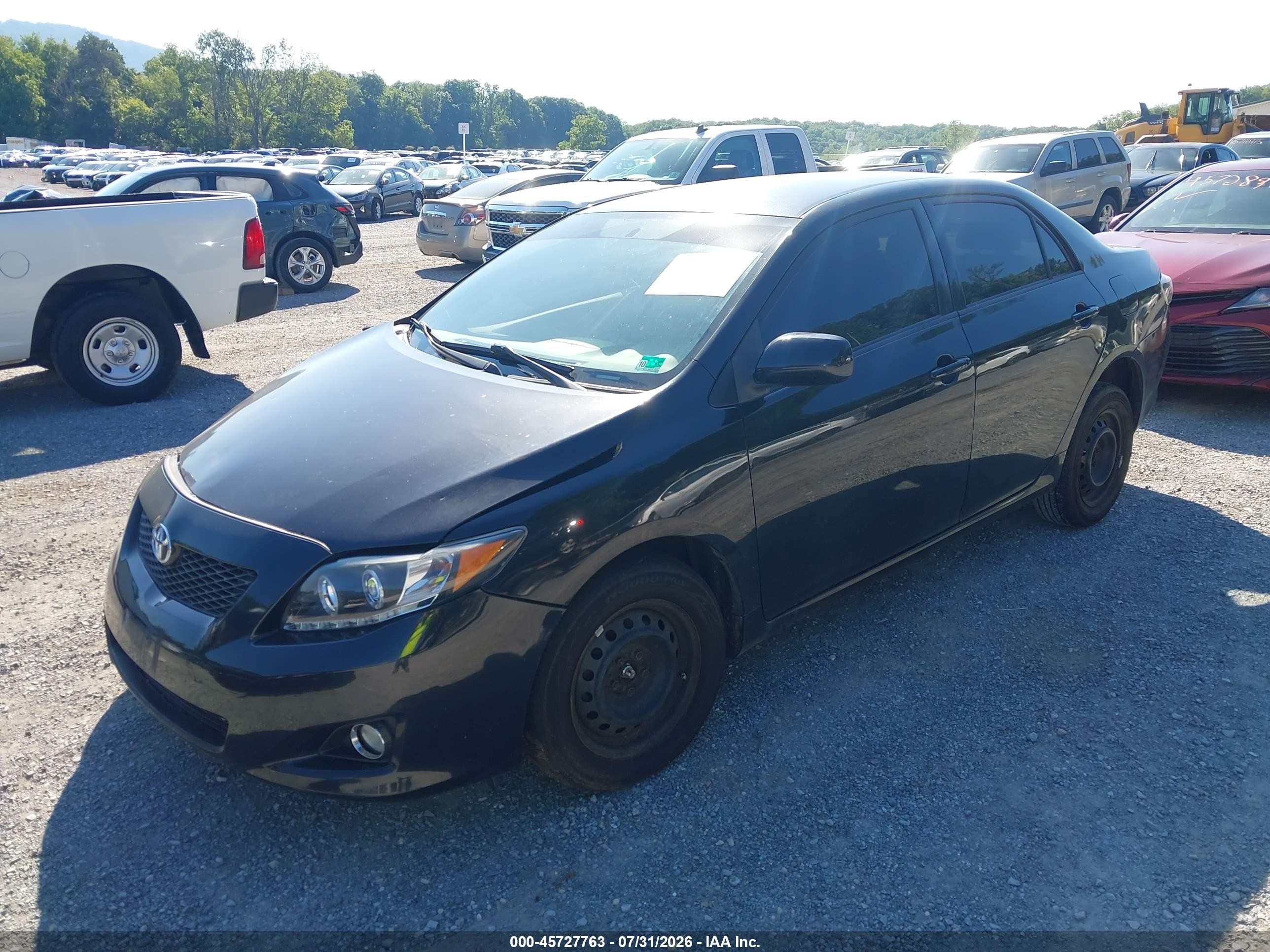 2010 Toyota Corolla Le Black vin: JTDBU4EE8A9104077