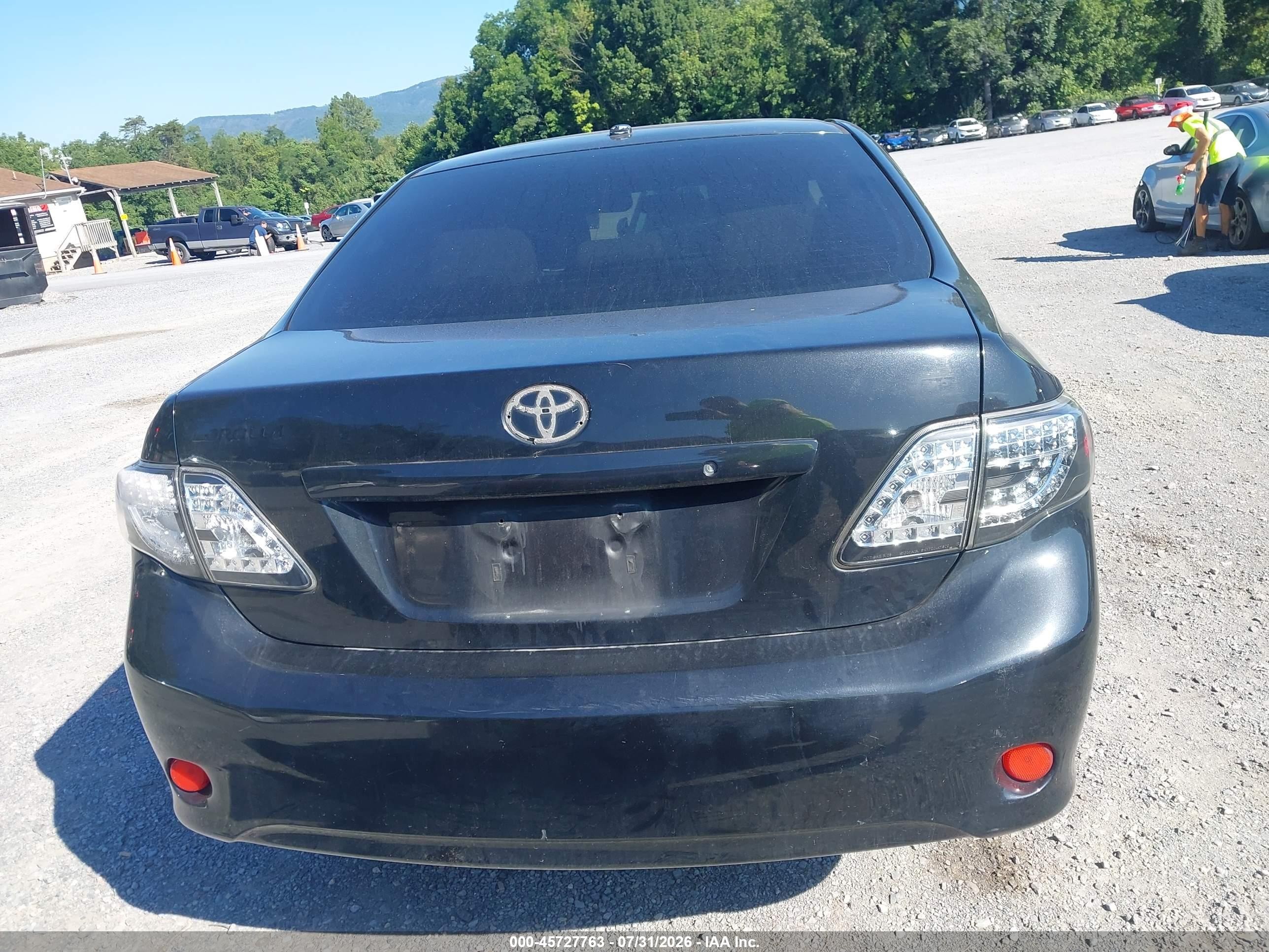 2010 Toyota Corolla Le Black vin: JTDBU4EE8A9104077