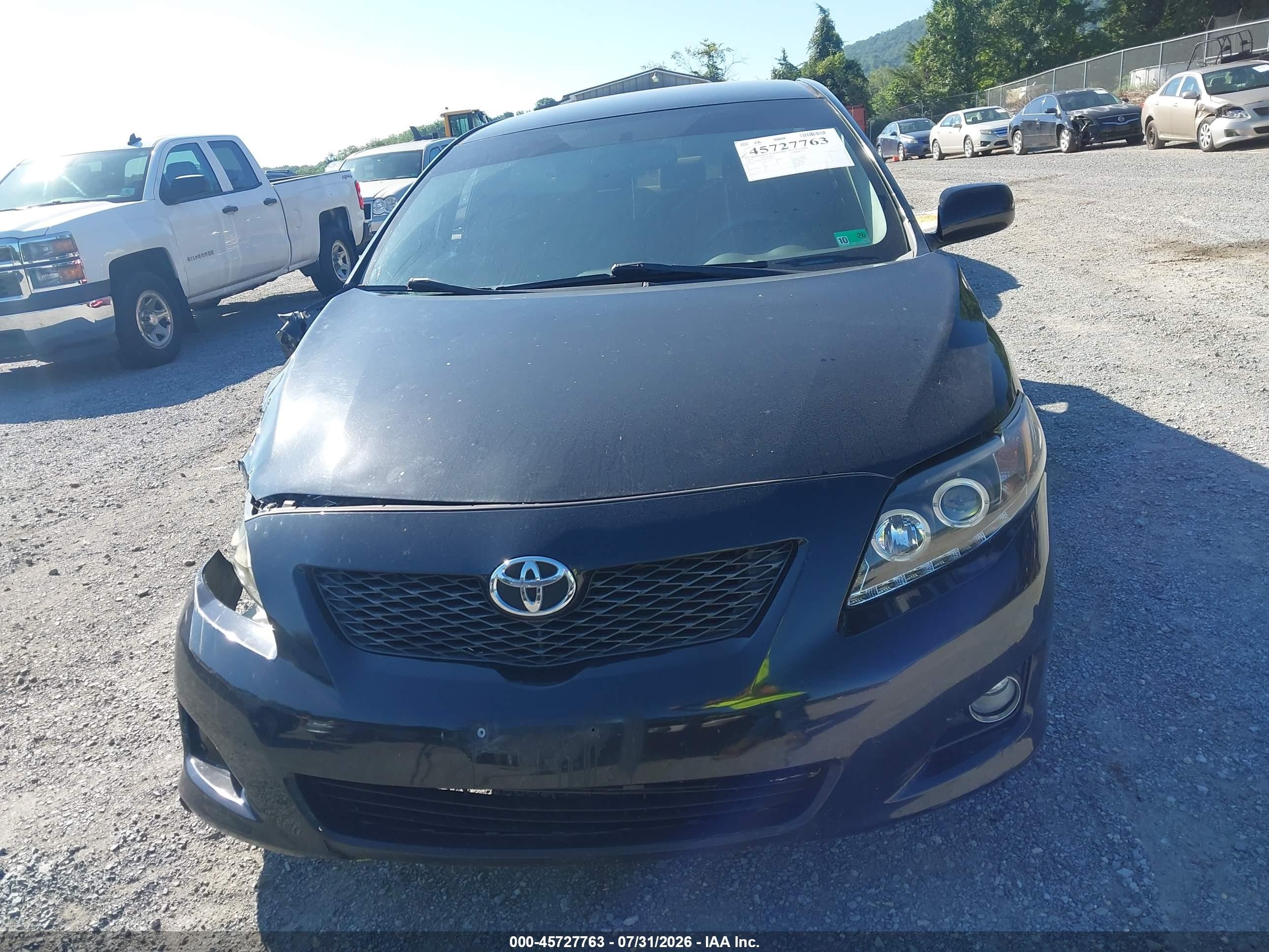 2010 Toyota Corolla Le Black vin: JTDBU4EE8A9104077