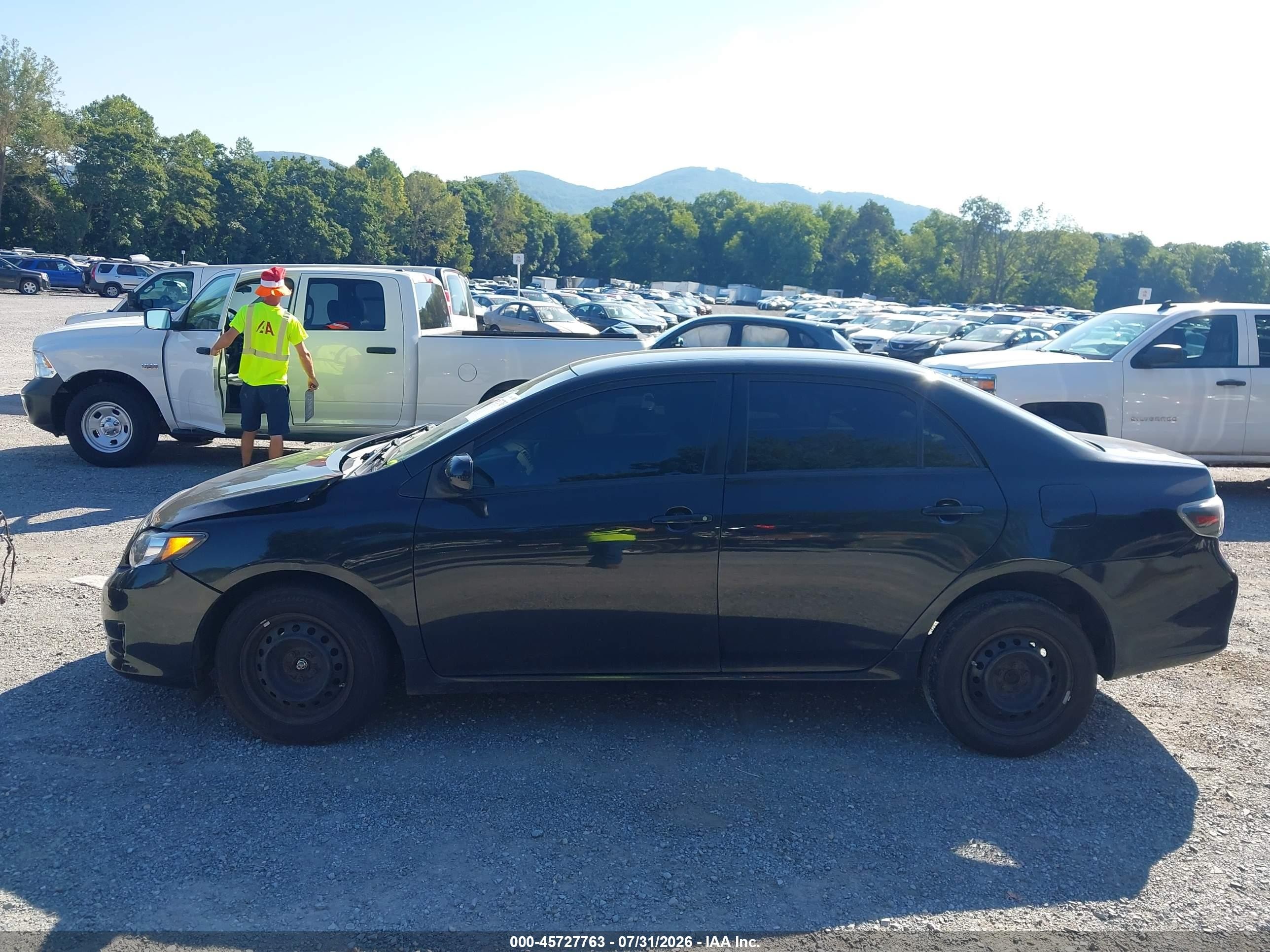 2010 Toyota Corolla Le Black vin: JTDBU4EE8A9104077