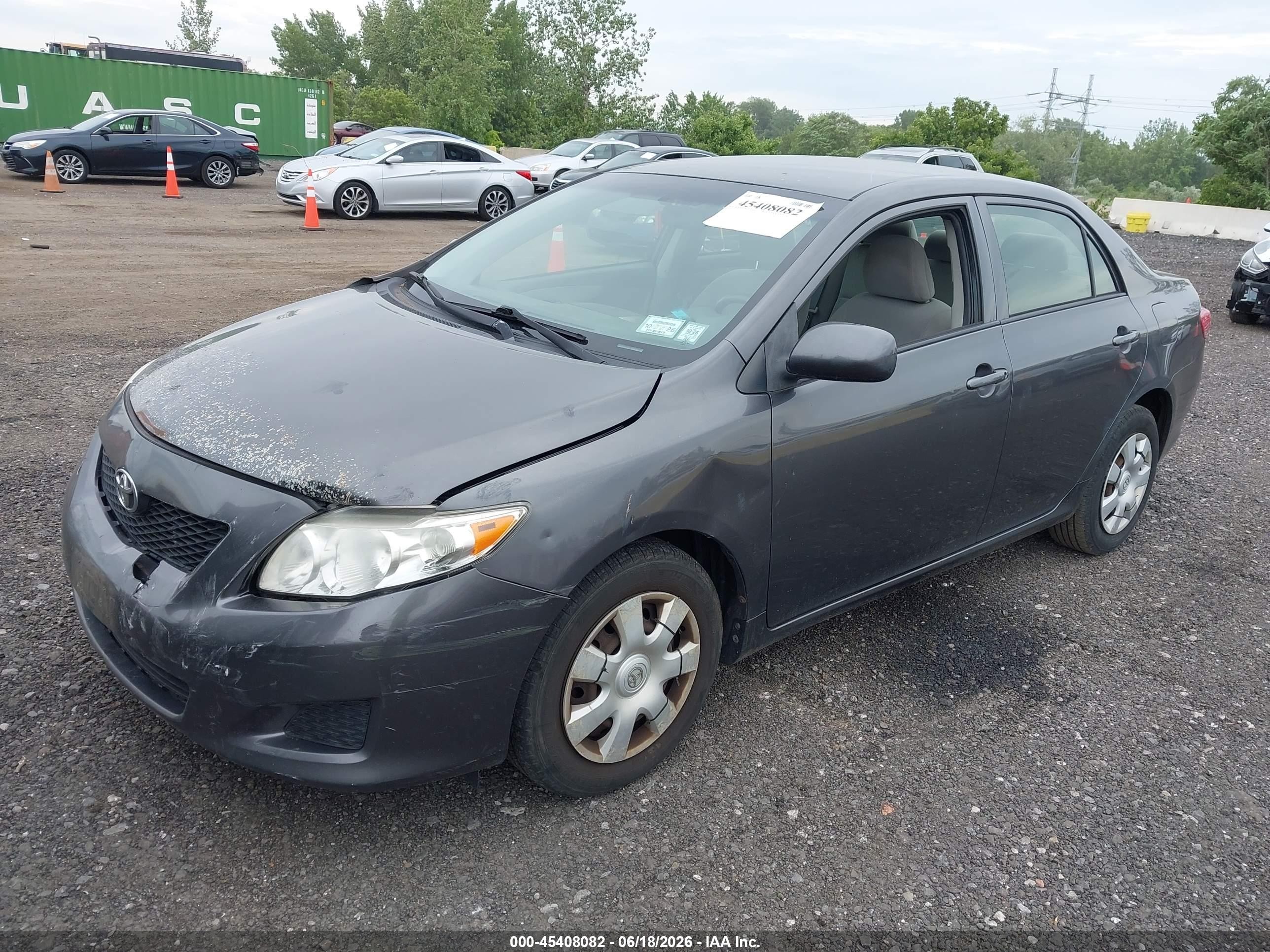 2010 Toyota Corolla Le Gray vin: JTDBU4EE8AJ077221