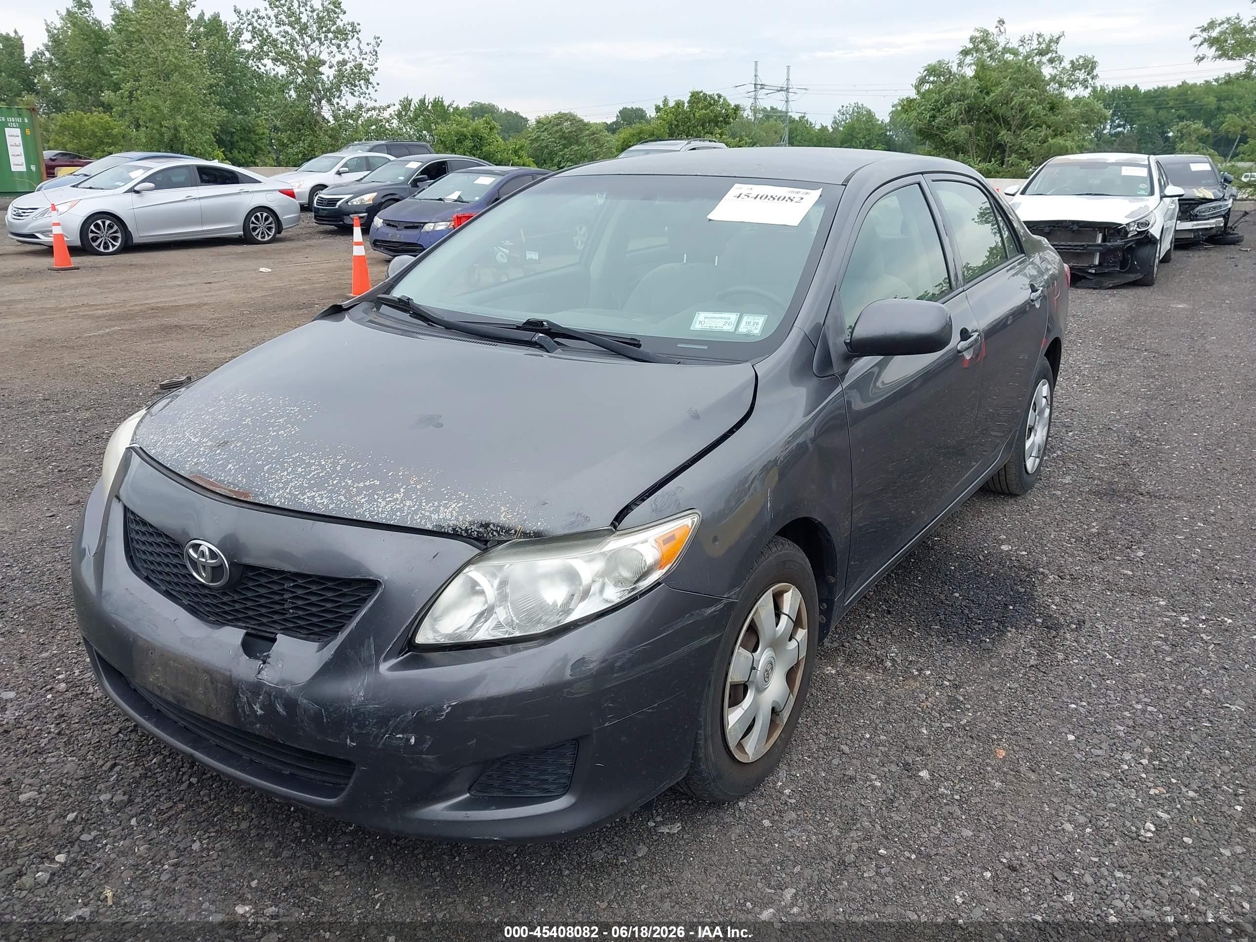 2010 Toyota Corolla Le Gray vin: JTDBU4EE8AJ077221