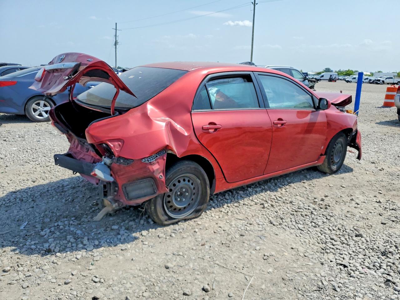 2011 Toyota Corolla Le Red vin: JTDBU4EE8B9129126