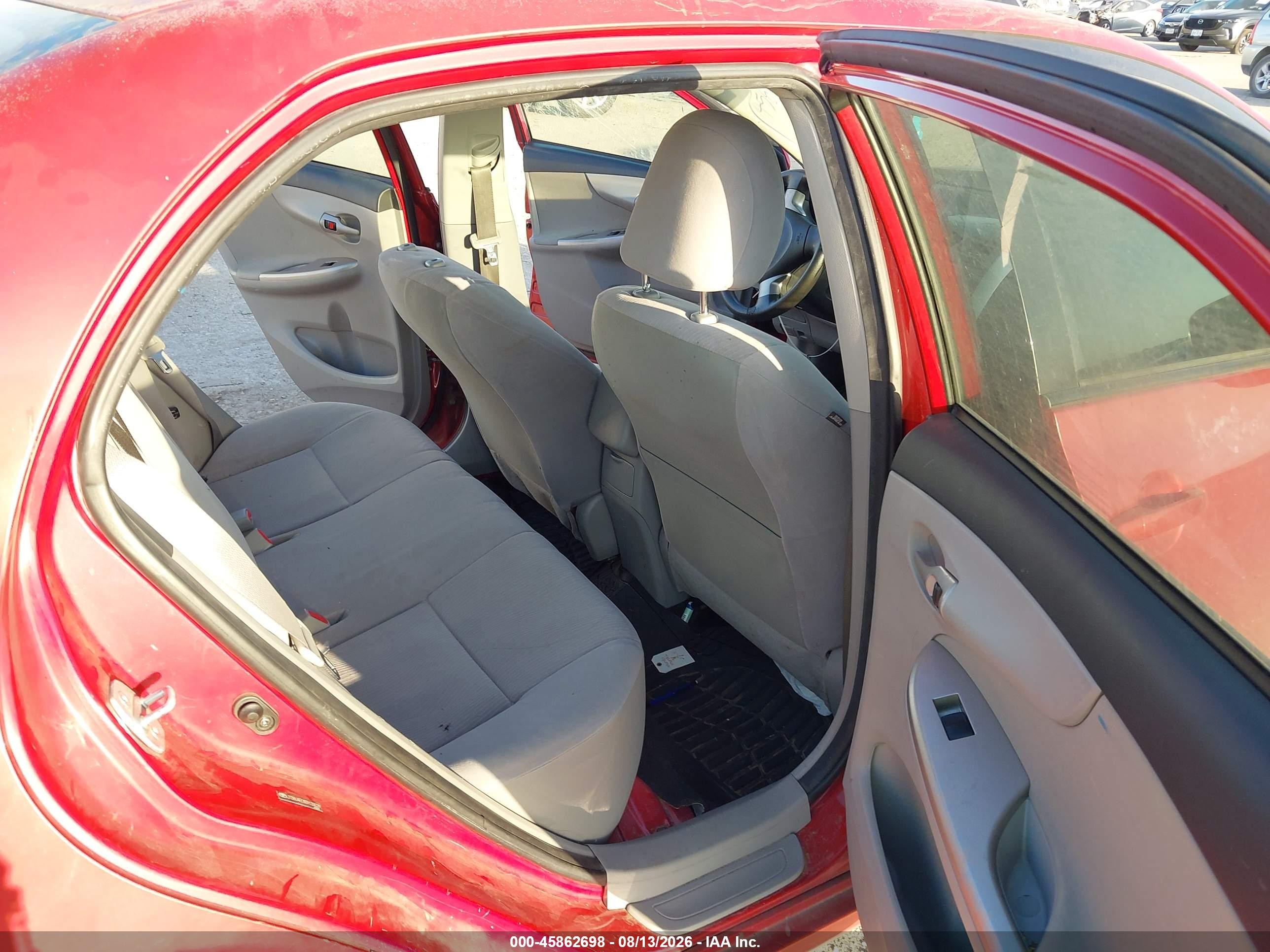 2011 Toyota Corolla Le Red vin: JTDBU4EE8B9133029