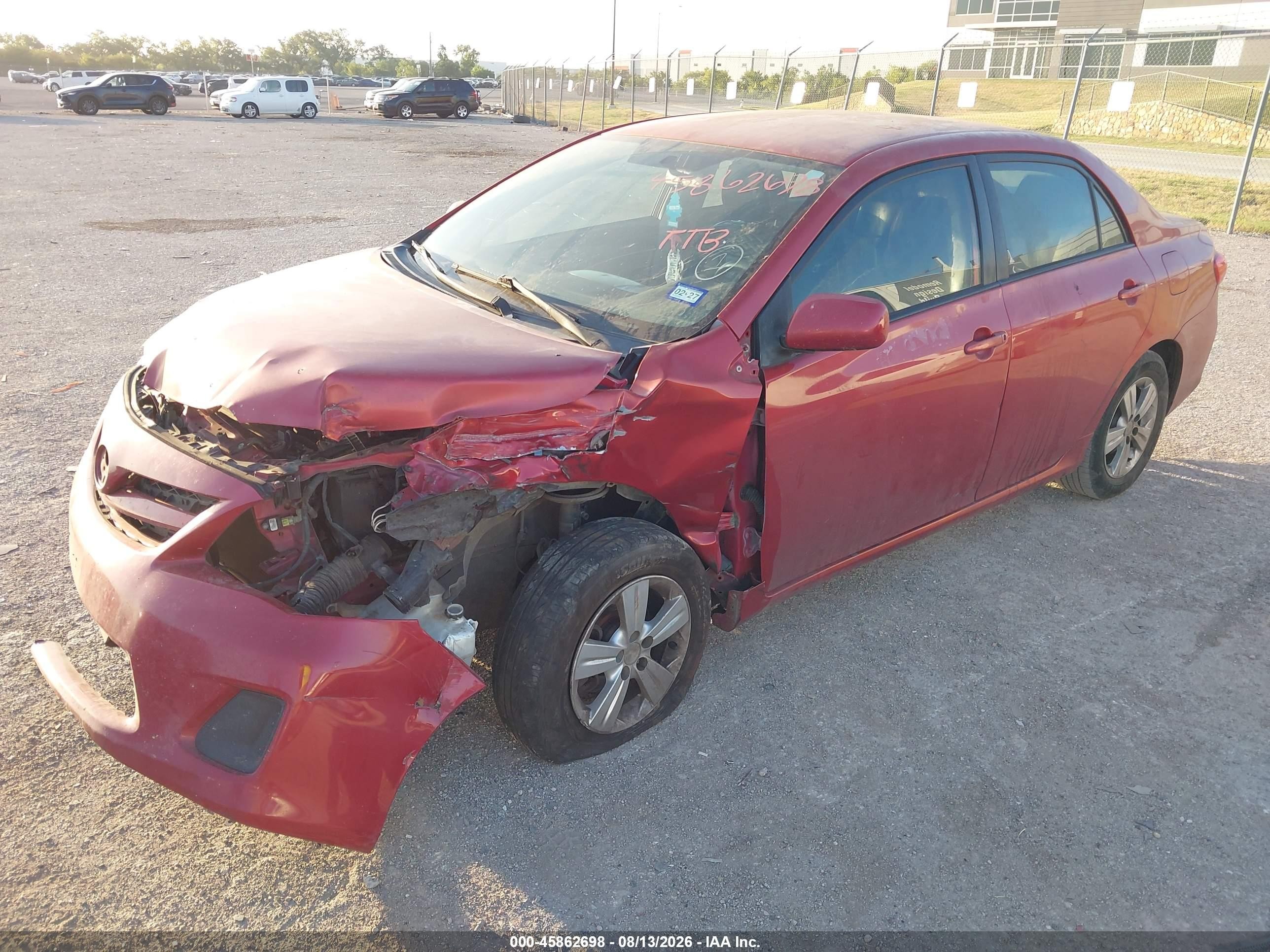 2011 Toyota Corolla Le Red vin: JTDBU4EE8B9133029