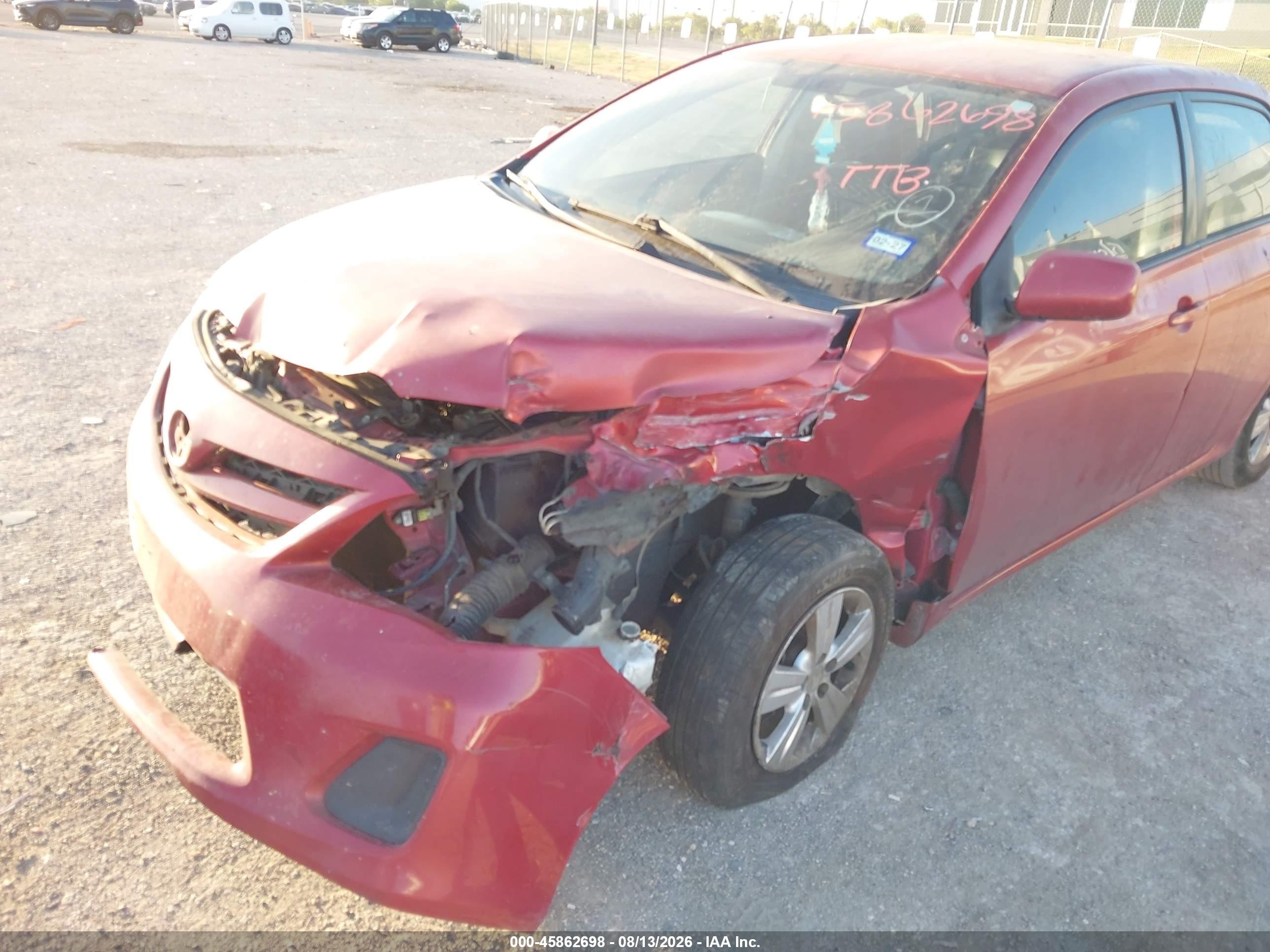 2011 Toyota Corolla Le Red vin: JTDBU4EE8B9133029