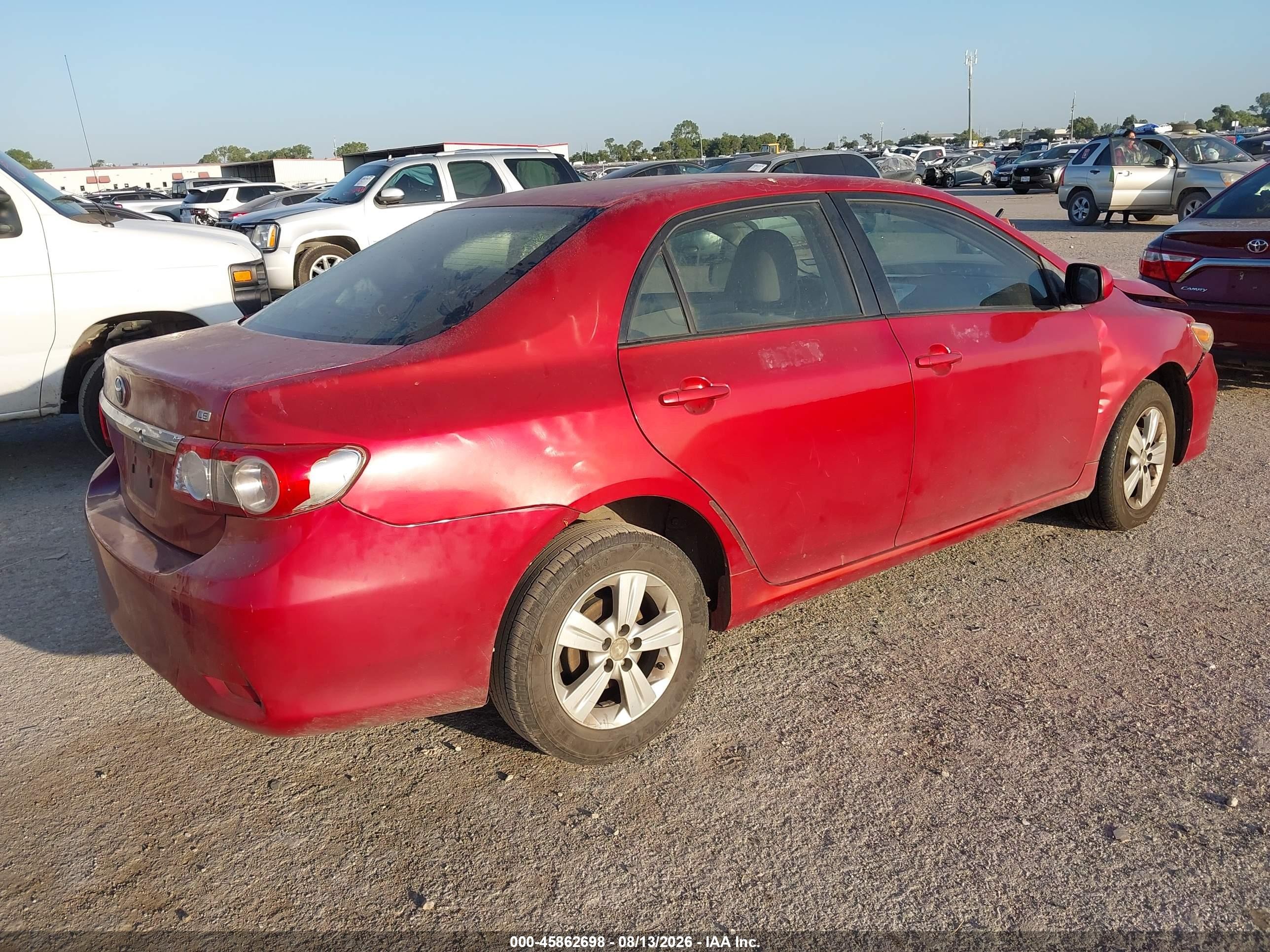 2011 Toyota Corolla Le Red vin: JTDBU4EE8B9133029