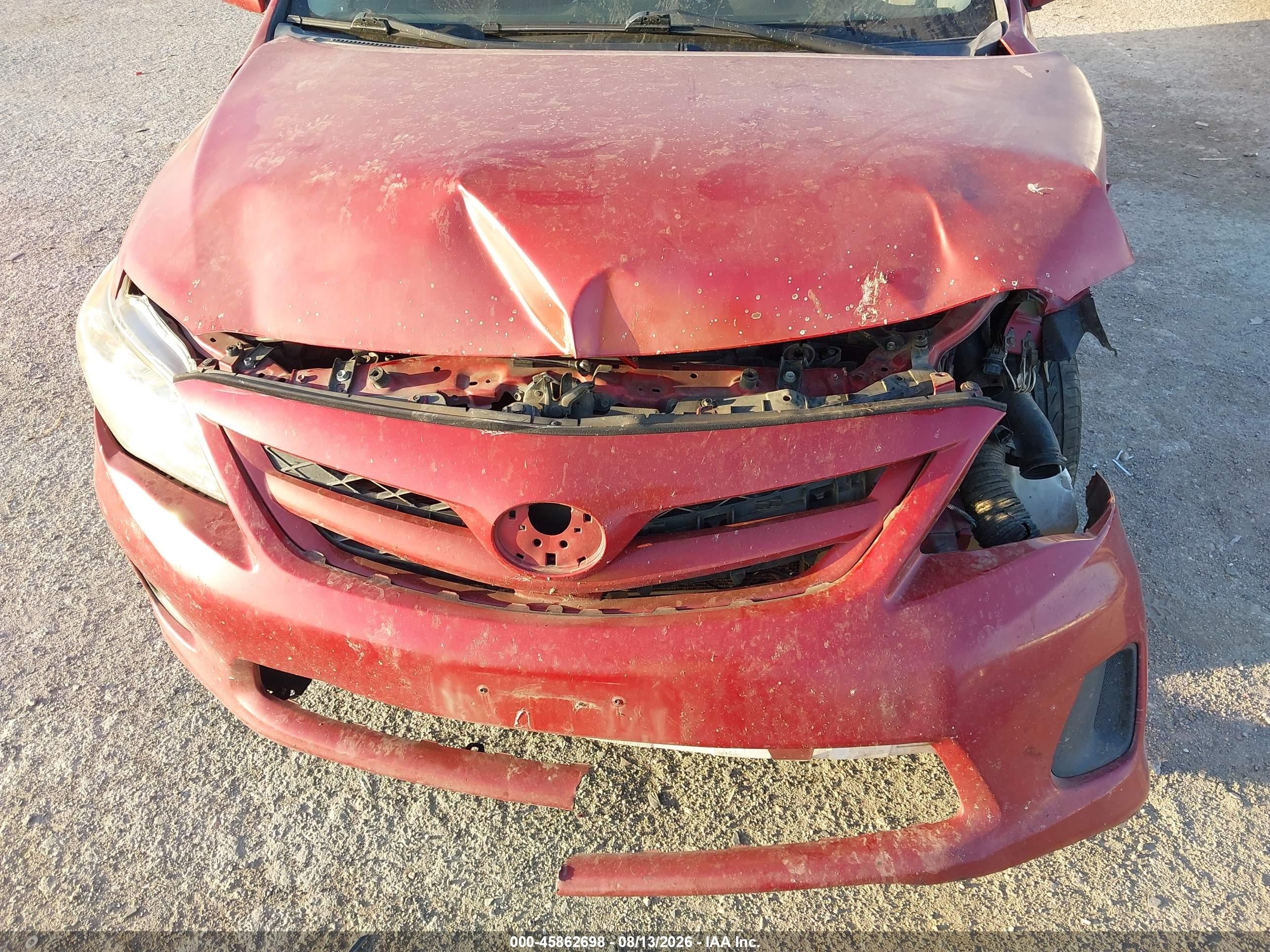 2011 Toyota Corolla Le Red vin: JTDBU4EE8B9133029