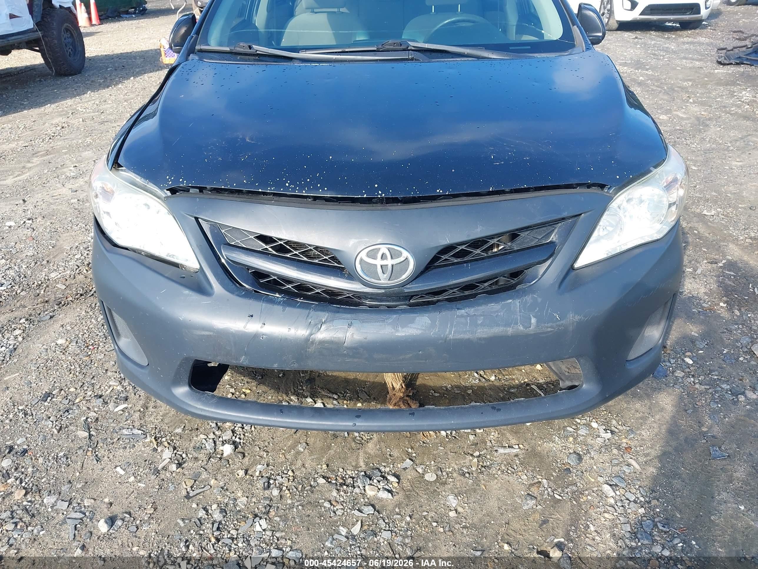 2011 Toyota Corolla Le Black vin: JTDBU4EE8B9135346