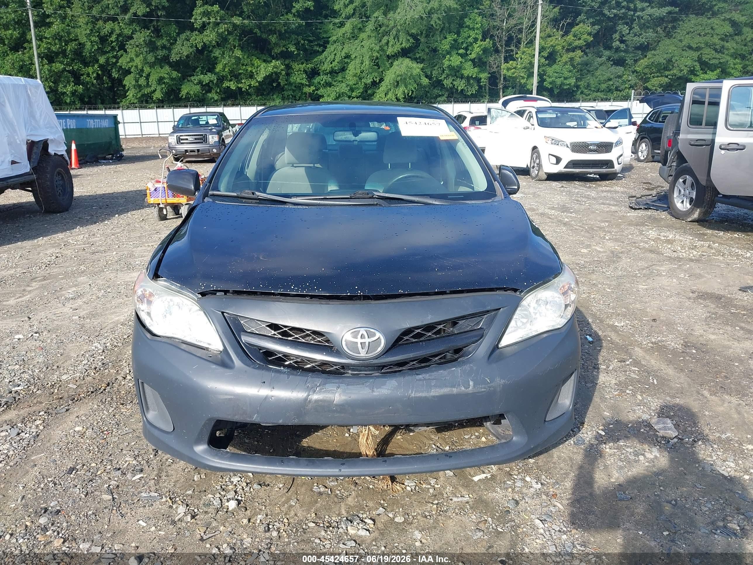 2011 Toyota Corolla Le Black vin: JTDBU4EE8B9135346