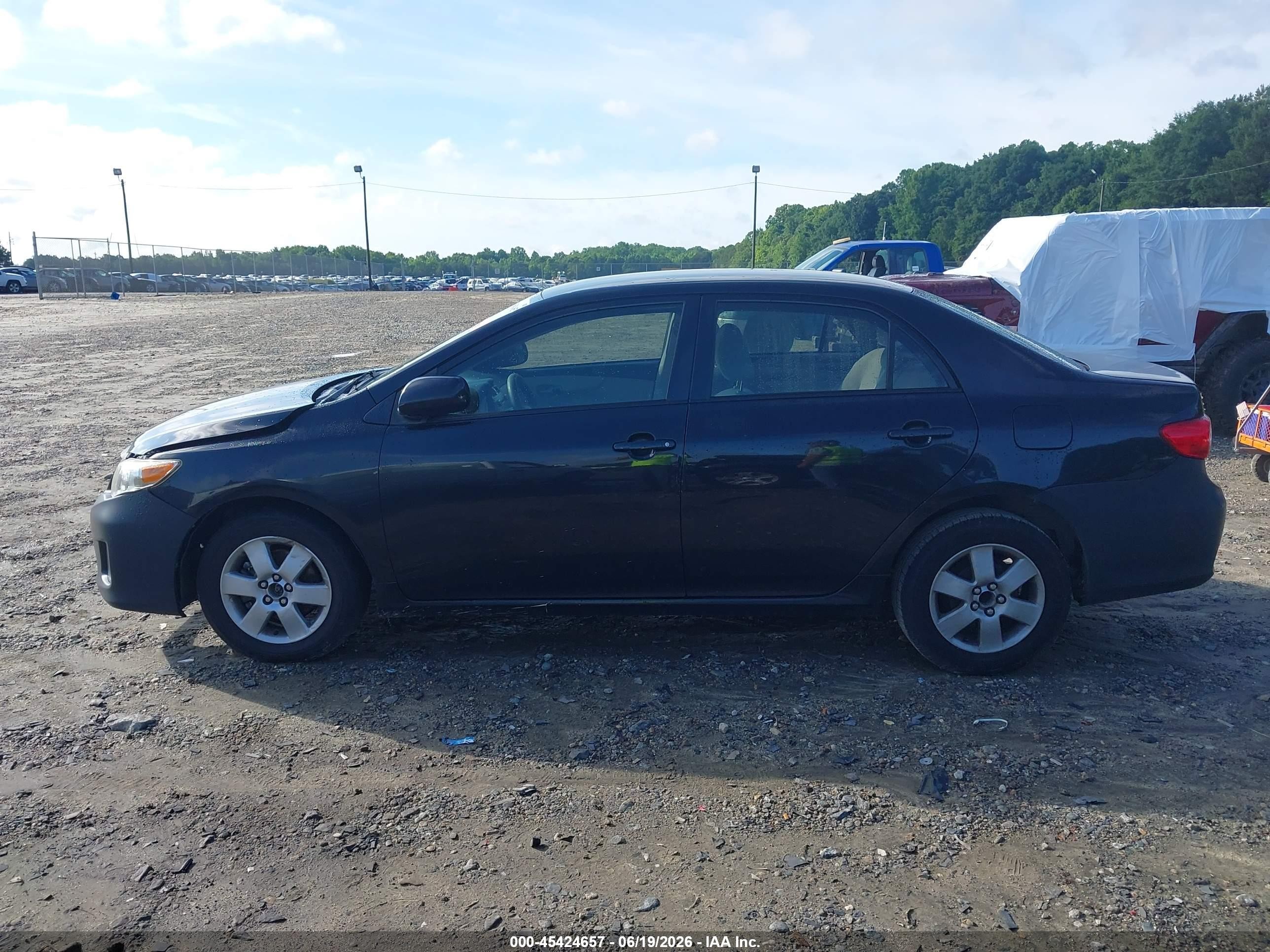2011 Toyota Corolla Le Black vin: JTDBU4EE8B9135346