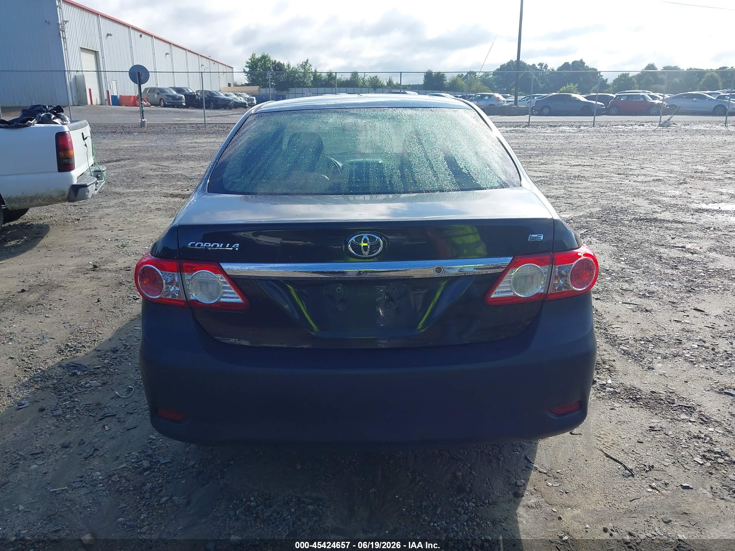 2011 Toyota Corolla Le Black vin: JTDBU4EE8B9135346