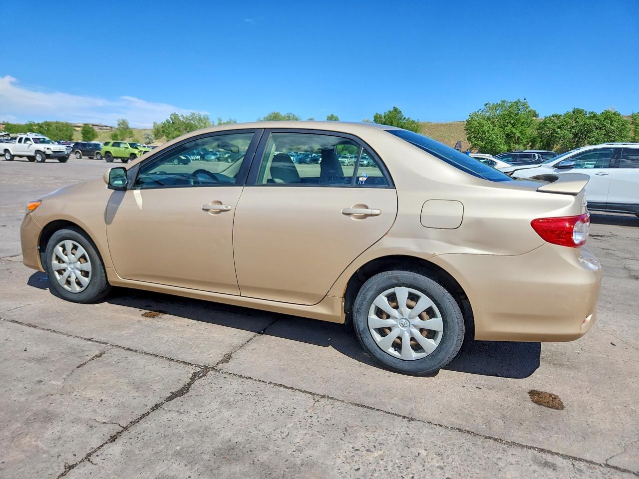 2011 Toyota Corolla Le Золотой vin: JTDBU4EE8B9135427
