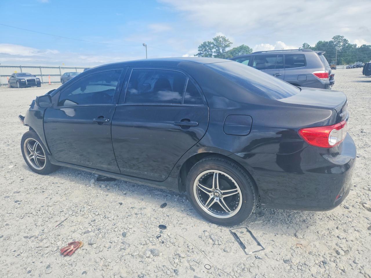 2011 Toyota Corolla Le Black vin: JTDBU4EE8B9137601