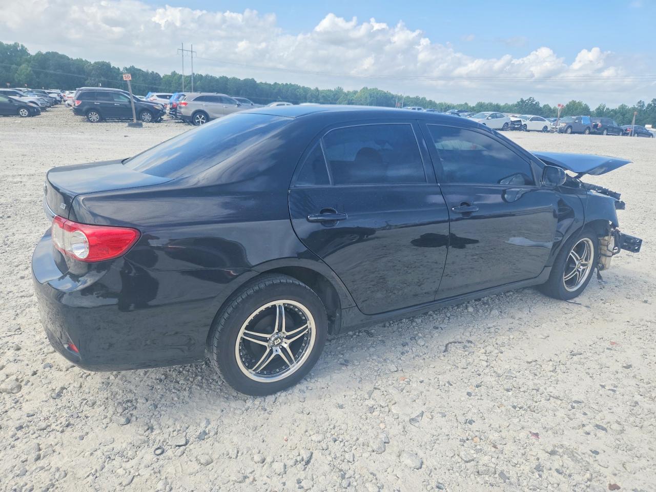 2011 Toyota Corolla Le Black vin: JTDBU4EE8B9137601