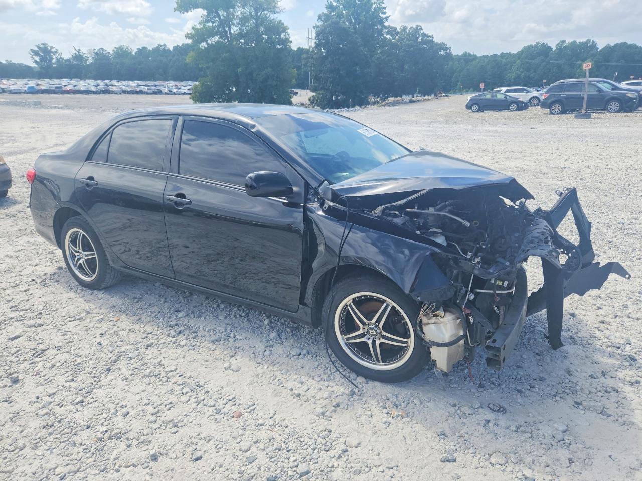 2011 Toyota Corolla Le Black vin: JTDBU4EE8B9137601