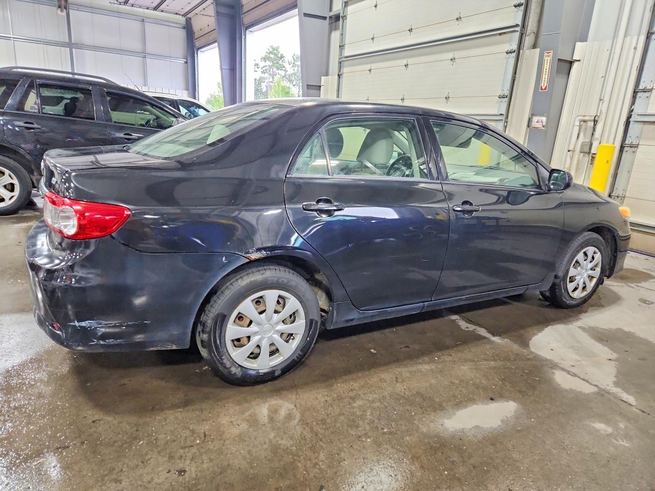 2011 Toyota Corolla Le Black vin: JTDBU4EE8B9151241