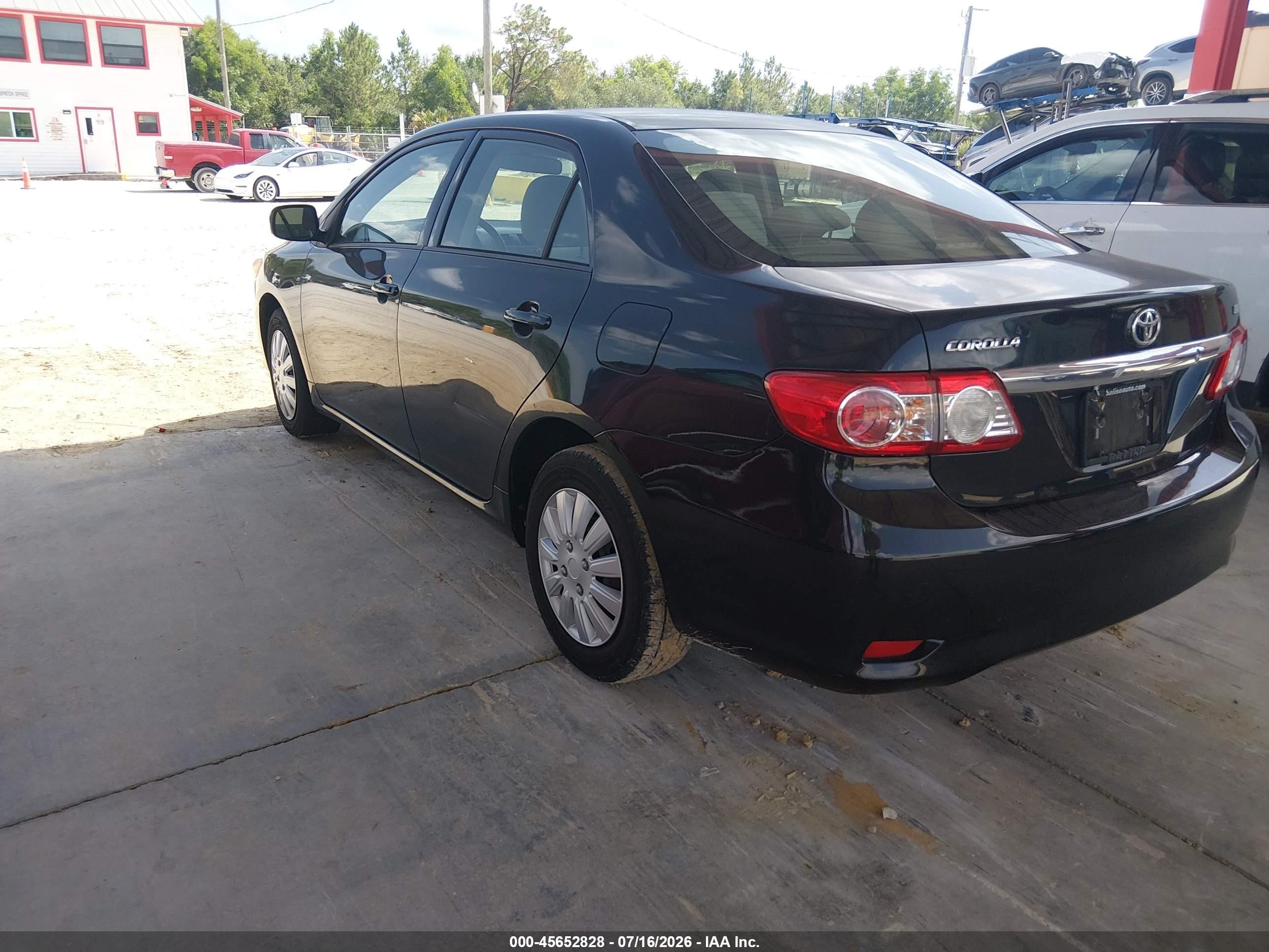 2011 Toyota Corolla Le Black vin: JTDBU4EE8BJ092271