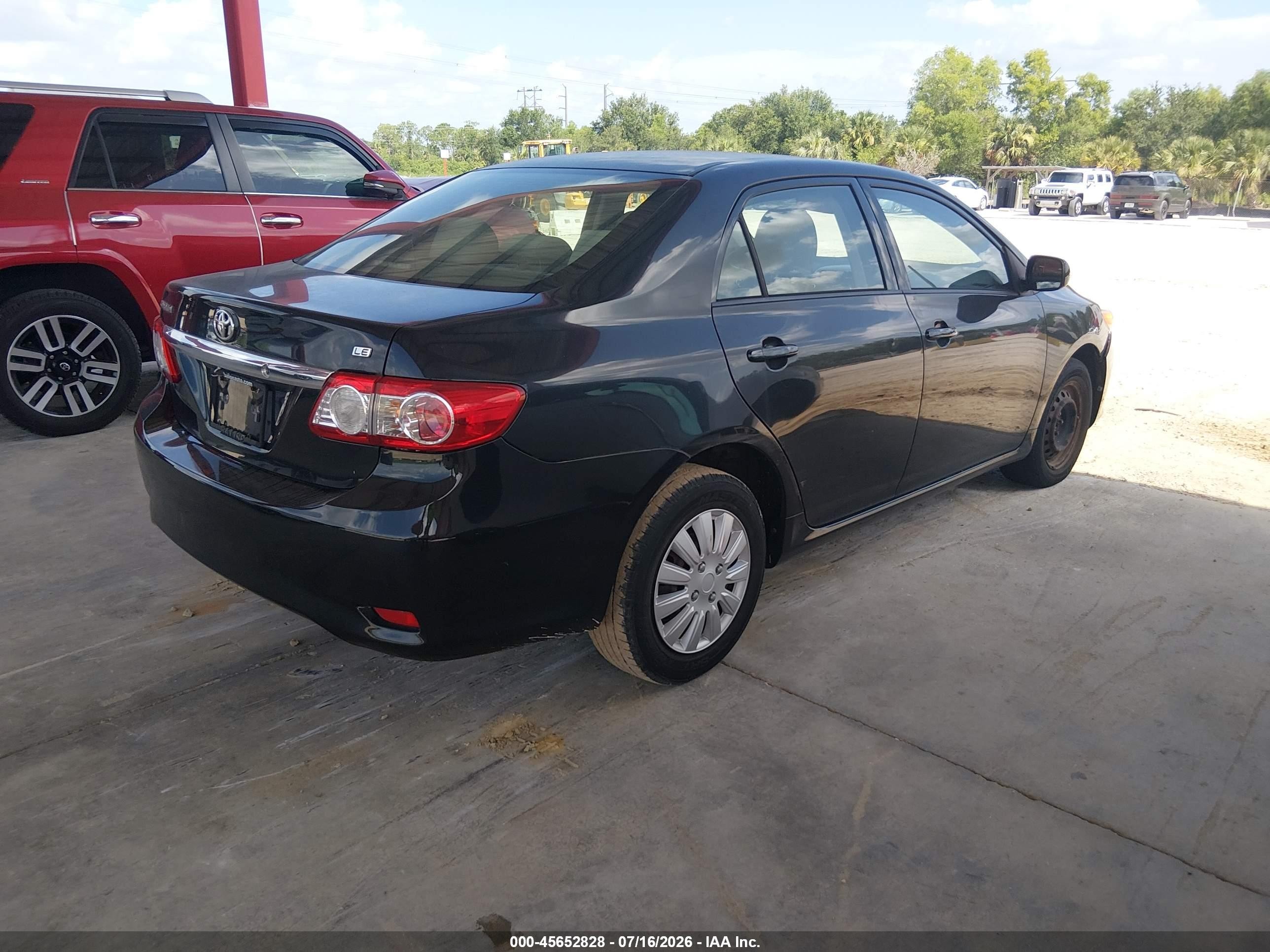 2011 Toyota Corolla Le Black vin: JTDBU4EE8BJ092271