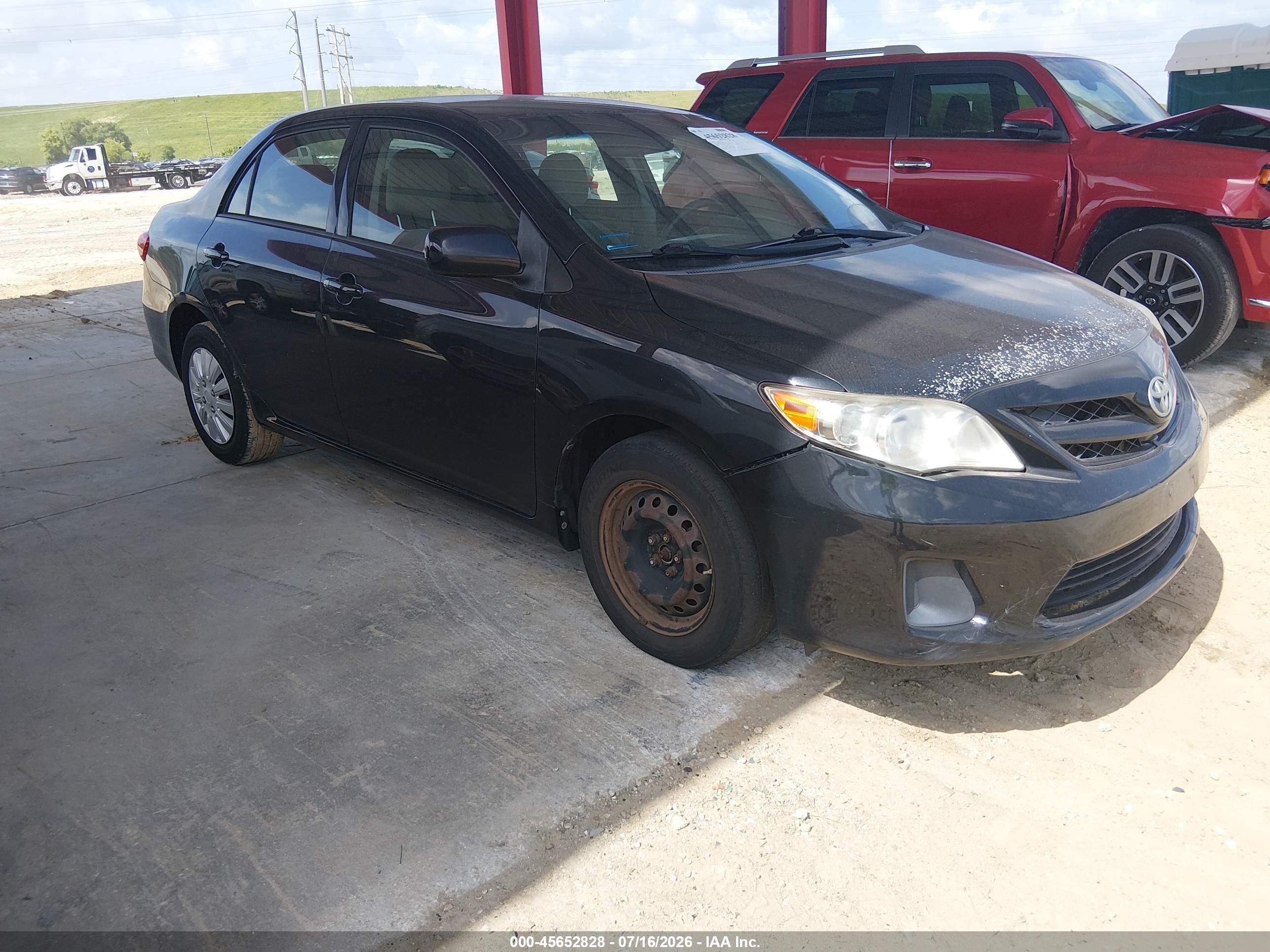 2011 Toyota Corolla Le Black vin: JTDBU4EE8BJ092271