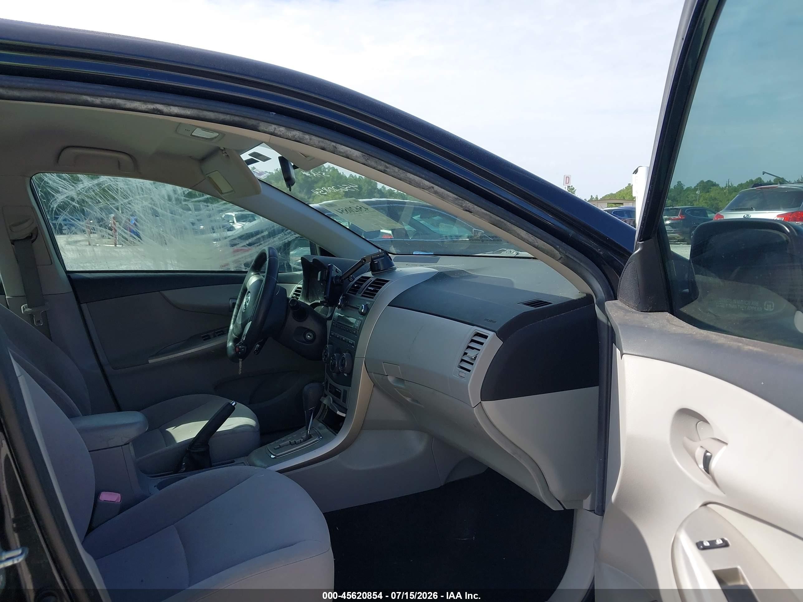2011 Toyota Corolla Le Black vin: JTDBU4EE8BJ092674