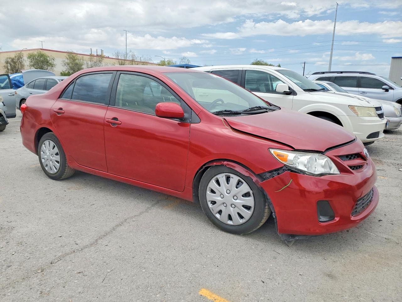 2012 Toyota Corolla Le Red vin: JTDBU4EE8C9172396