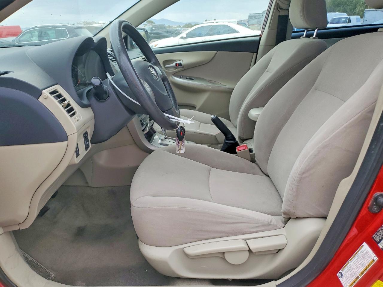 2012 Toyota Corolla Le Red vin: JTDBU4EE8C9172396