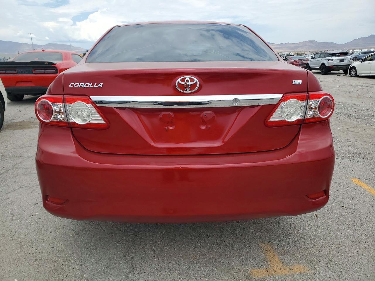 2012 Toyota Corolla Le Red vin: JTDBU4EE8C9172396
