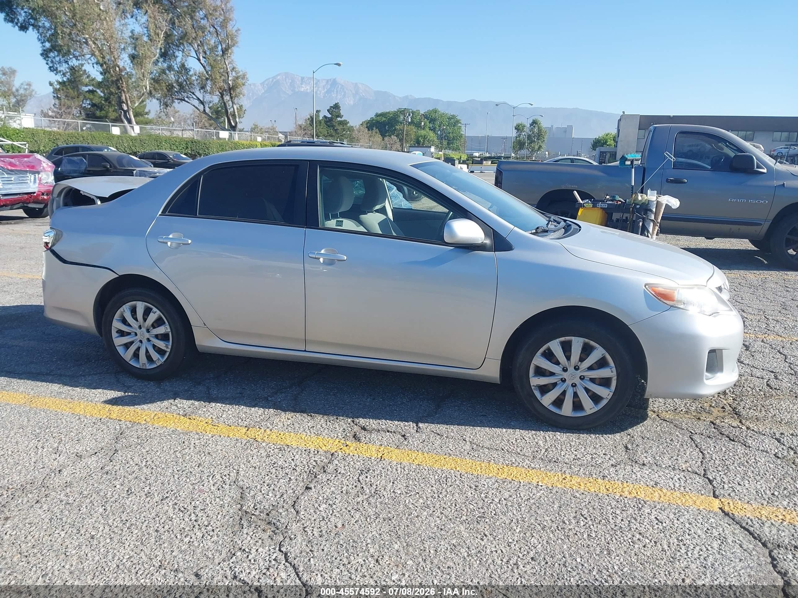 2012 Toyota Corolla Le Silver vin: JTDBU4EE8C9172415