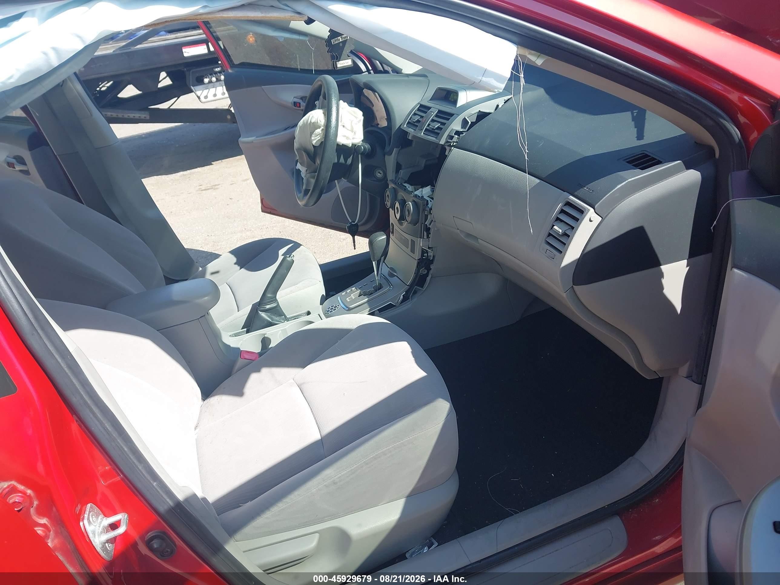 2012 Toyota Corolla Le Red vin: JTDBU4EE8C9180532