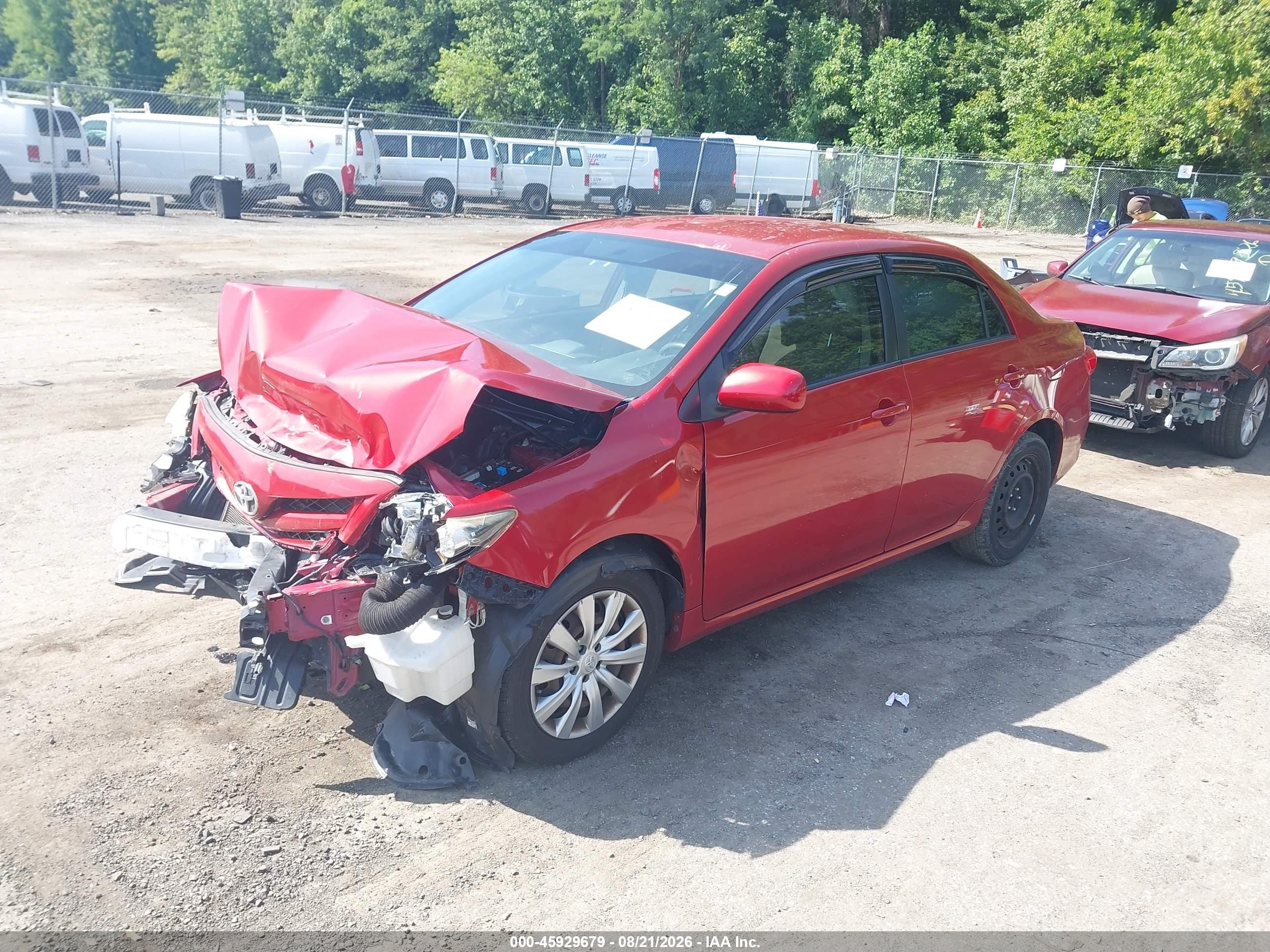 2012 Toyota Corolla Le Red vin: JTDBU4EE8C9180532
