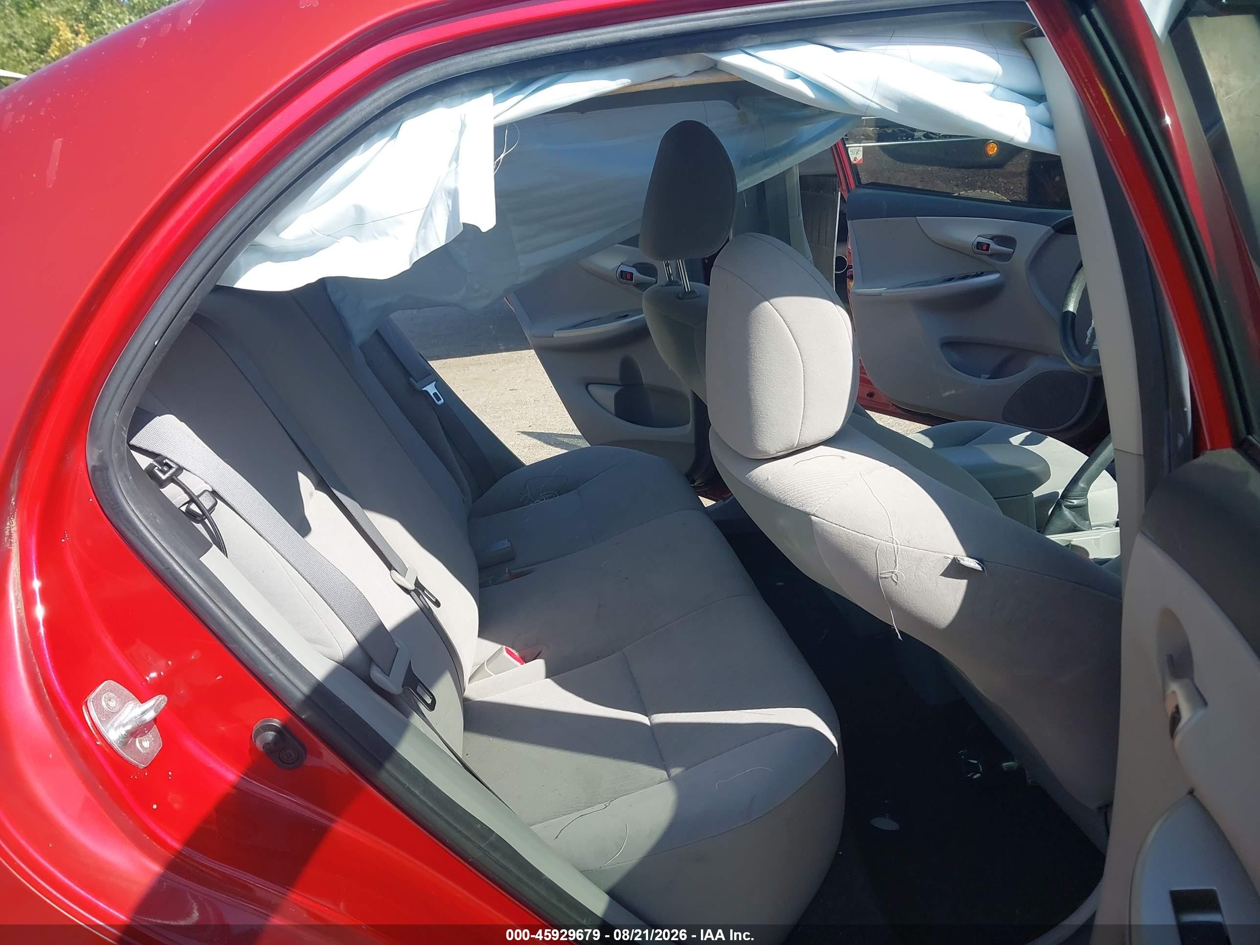 2012 Toyota Corolla Le Red vin: JTDBU4EE8C9180532