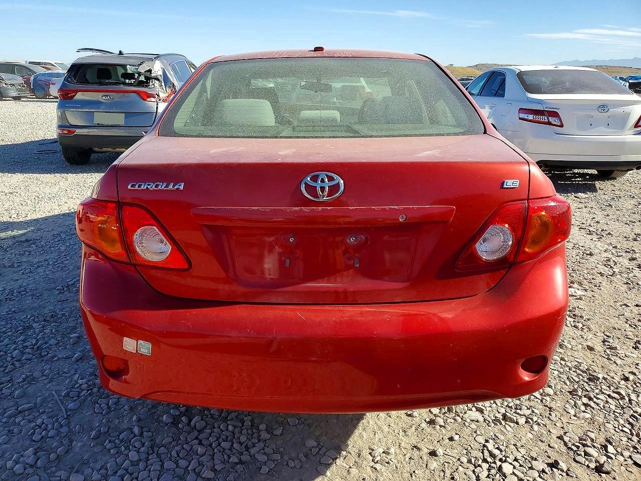 2010 Toyota Corolla Le Red vin: JTDBU4EE9AJ061433