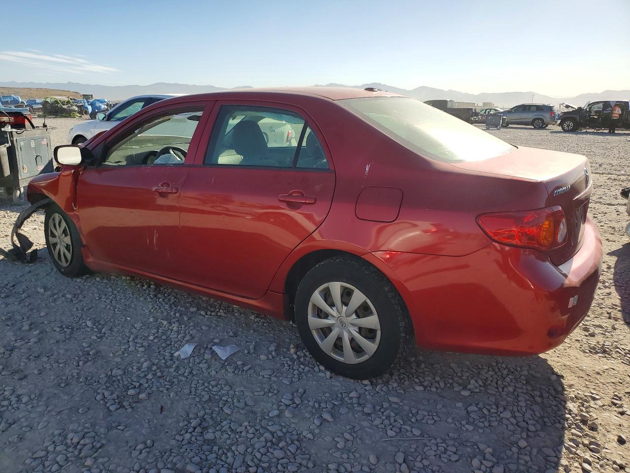 2010 Toyota Corolla Le Red vin: JTDBU4EE9AJ061433