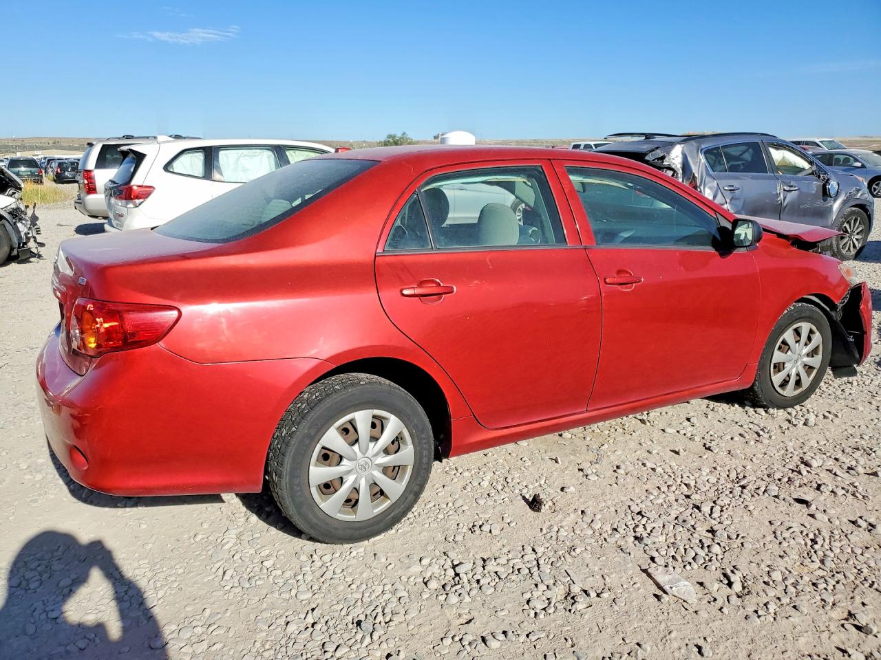 2010 Toyota Corolla Le Red vin: JTDBU4EE9AJ061433