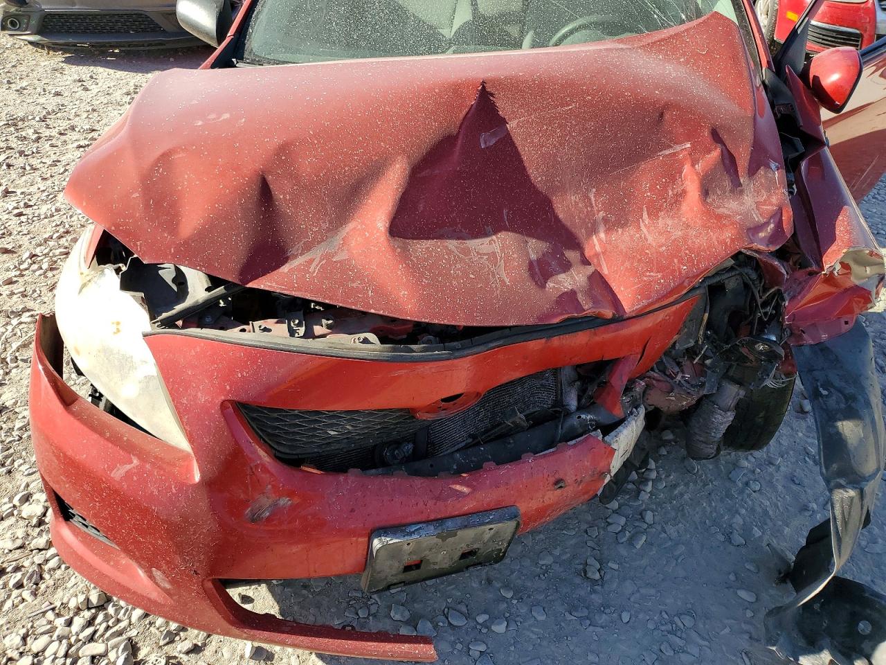 2010 Toyota Corolla Le Red vin: JTDBU4EE9AJ061433