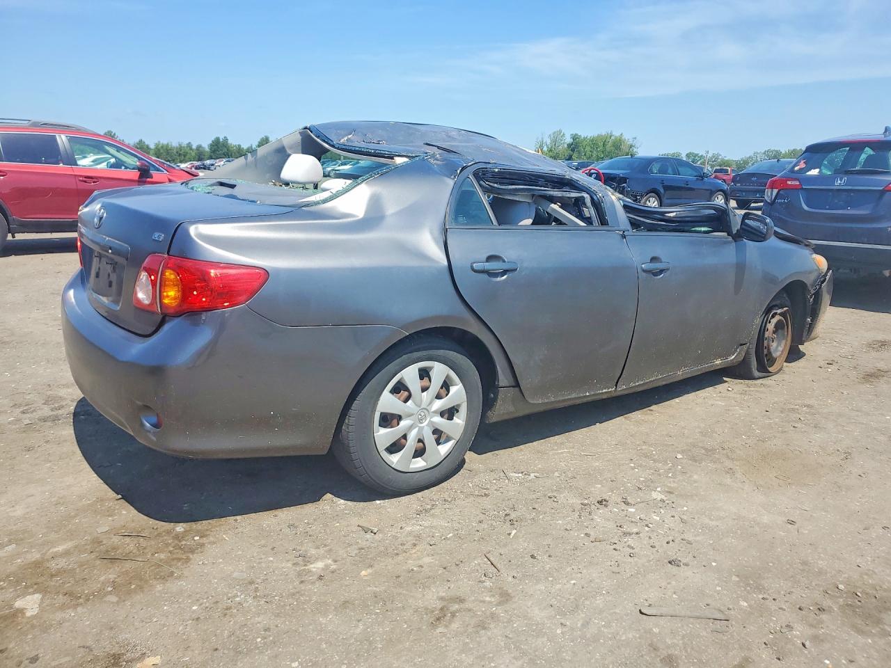 2010 Toyota Corolla Le Gray vin: JTDBU4EE9AJ065840